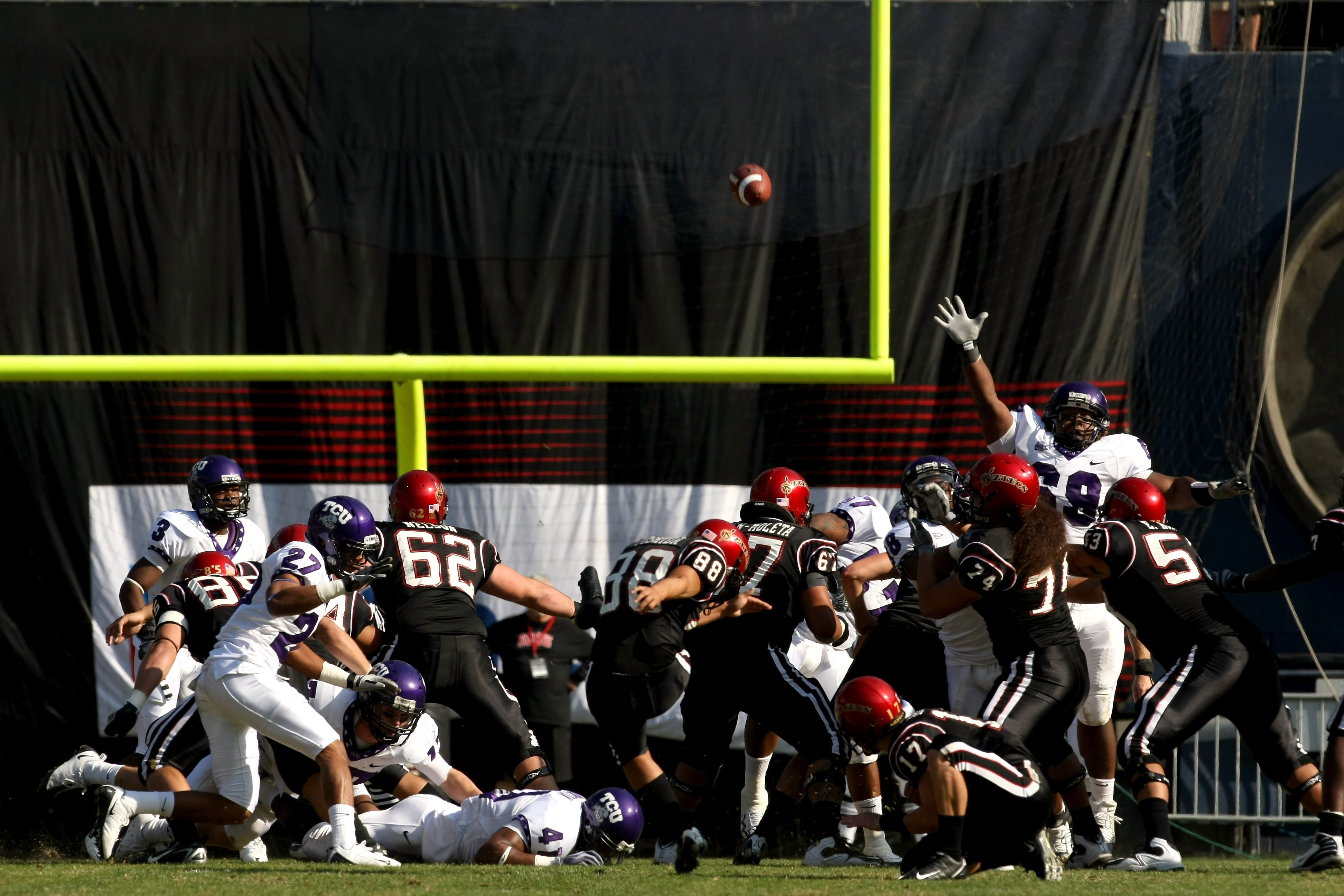SAN DIEGO - NOVEMBER 7:  Kicker Lane Yoshida #88 of the San Diego State Aztecs kicks a 48 yard field goal in the second quarter against the Texas Christian University Horned Frogs on November 7, 2009 at Qualcomm Stadium in San Diego, California.   TCU won