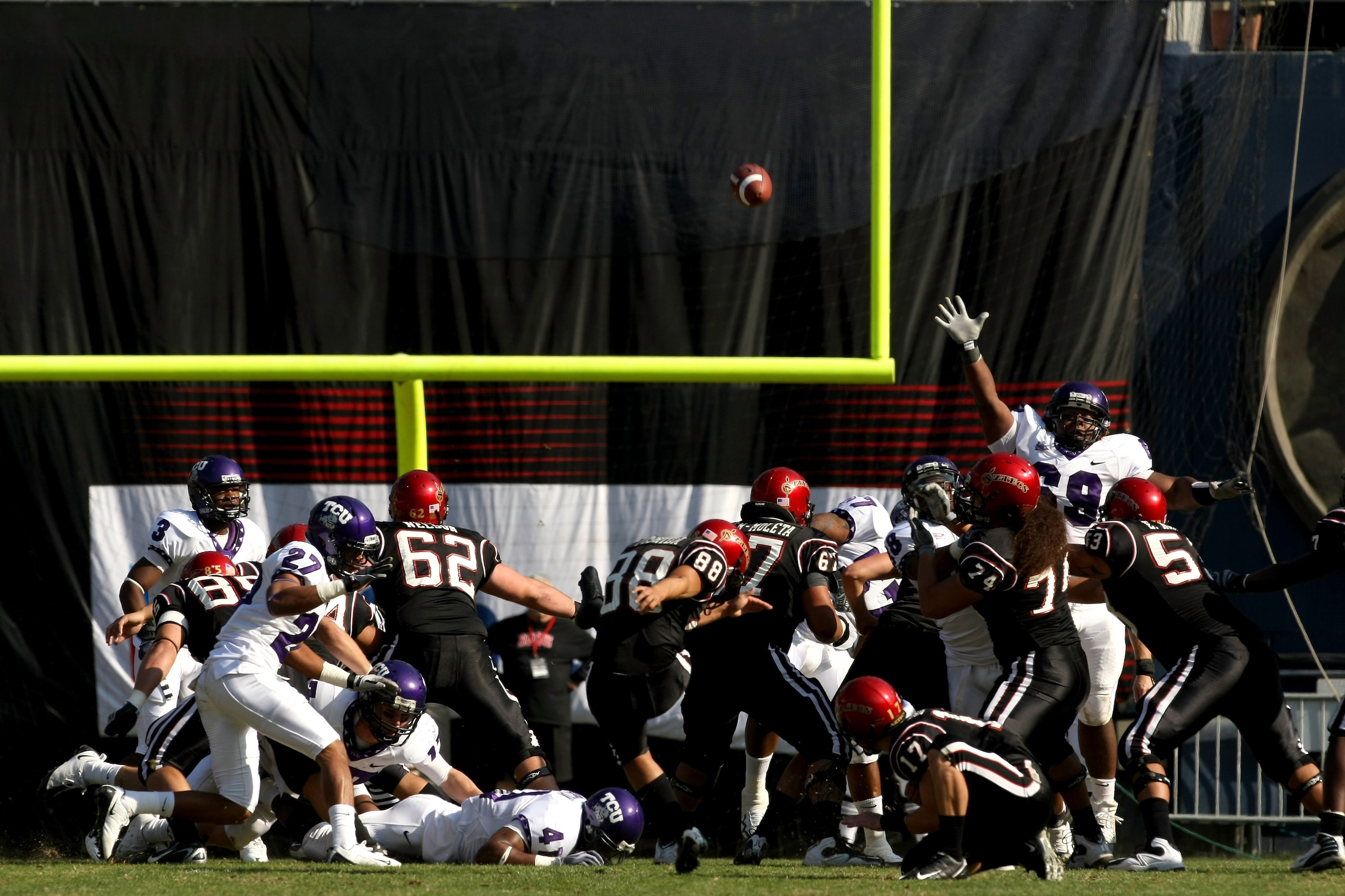 SAN DIEGO - NOVEMBER 7: Kicker Lane Yoshida #88 of the San Diego State Aztecs kicks a 48 yard field goal in the second quarter against the Texas Christian University Horned Frogs on November 7, 2009 at Qualcomm Stadium in San Diego, California. TCU won SAN DIEGO - NOVEMBER 7: Kicker Lane Yoshida #88 of the San Diego State Aztecs kicks a 48 yard field goal in the second quarter against the Texas Christian University Horned Frogs on November 7, 2009 at Qualcomm Stadium in San Diego, California. TCU won