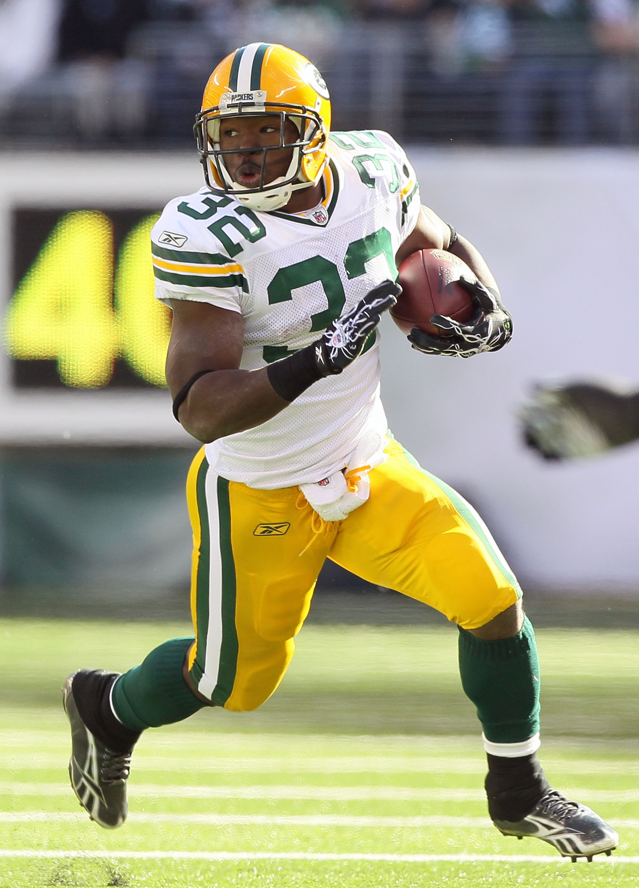 EAST RUTHERFORD, NJ - OCTOBER 31:  Brandon Jackson #32 of the Green Bay Packers runs the ball against the New York Jets on October 31, 2010 at the New Meadowlands Stadium in East Rutherford, New Jersey.  (Photo by Jim McIsaac/Getty Images)
