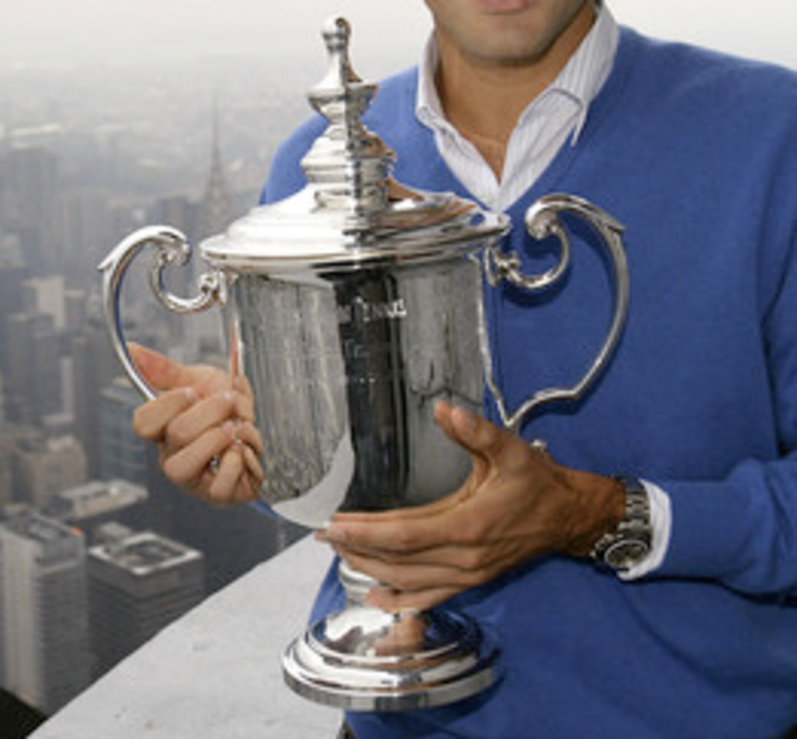 This trophy belongs to he who is humble, gracious, generous, and most of all, a true tennis champion. This trophy belongs to he who is humble, gracious, generous, and most of all, a true tennis champion.