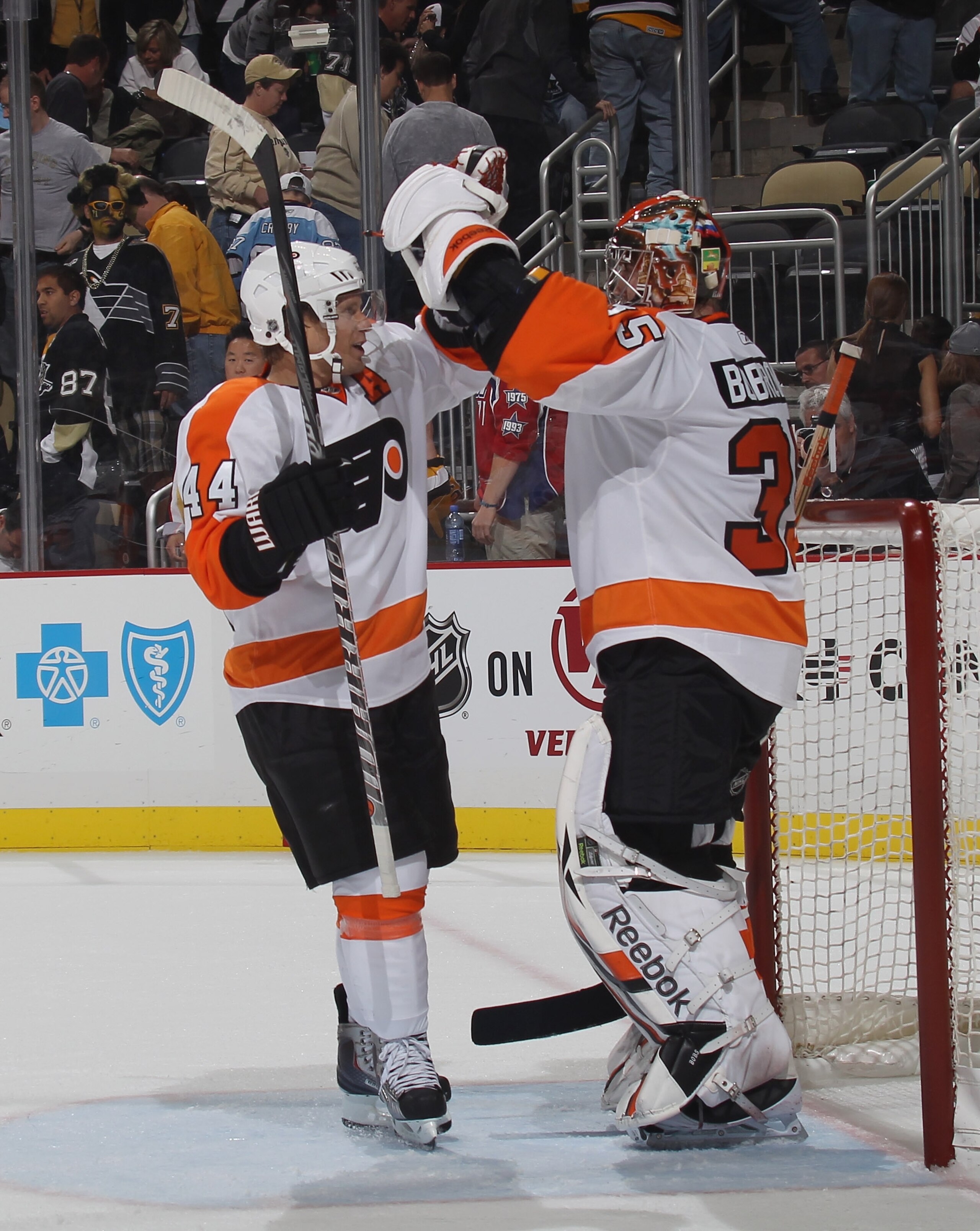 PITTSBURGH - OCTOBER 07: Kimmo Timonen #44 and Sergei Bobrovsky #35 of the Philadelphia Flyers celebrate their season opening win over the Pittsburgh Penguins at the Consol Energy Center on October 7, 2010 in Pittsburgh, Pennsylvania.  (Photo by Bruce Ben