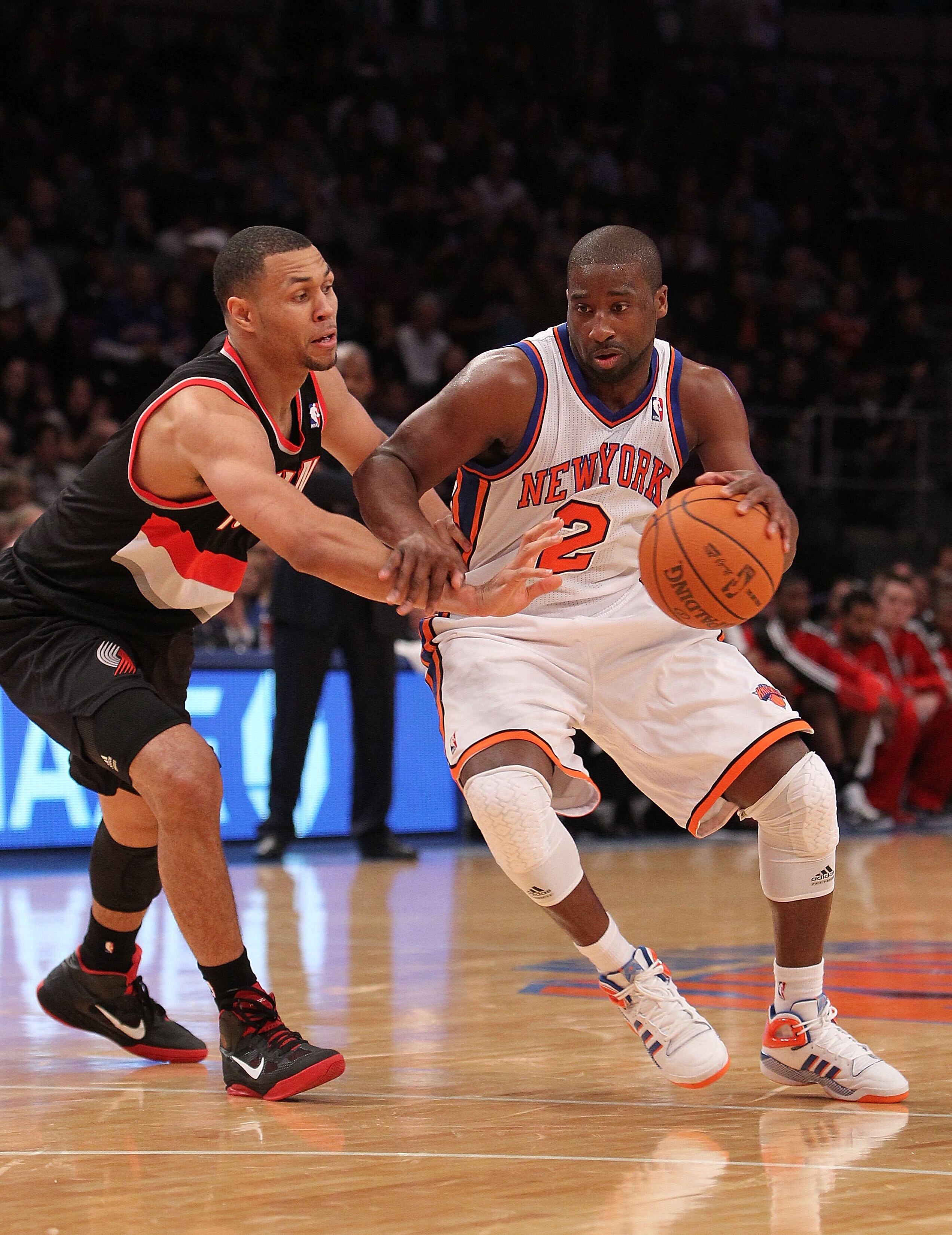 NEW YORK - OCTOBER 30: Raymond Felton #2 of the New York Knicks drives the ball past Brandon Roy #7 of the Portland Trail Blazers at Madison Square Garden on October 30, 2010 in New York City. NOTE TO USER: User expressly acknowledges and agrees that, by