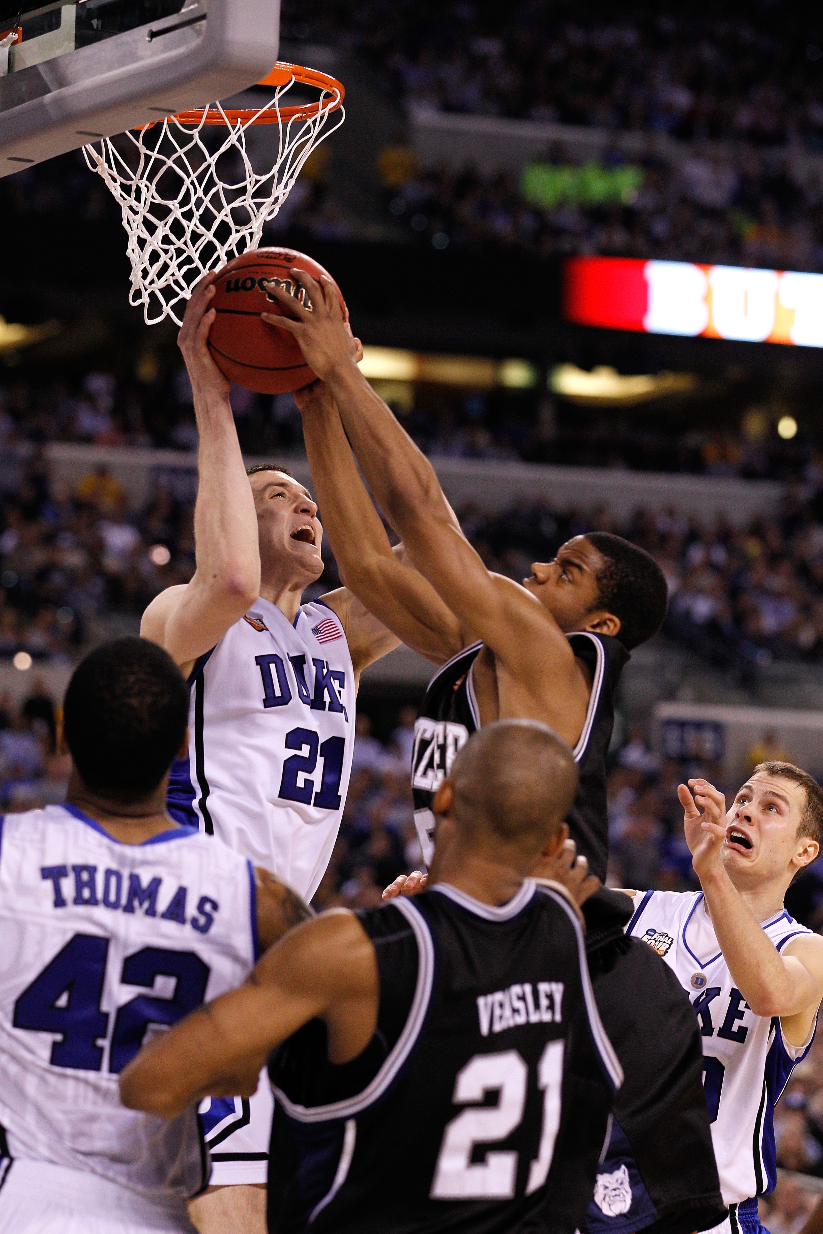 INDIANAPOLIS - APRIL 05:  Miles Plumlee #21 of the Duke Blue Devils fights for a rebound against the Butler Bulldogs during the 2010 NCAA Division I Men's Basketball National Championship game at Lucas Oil Stadium on April 5, 2010 in Indianapolis, Indiana