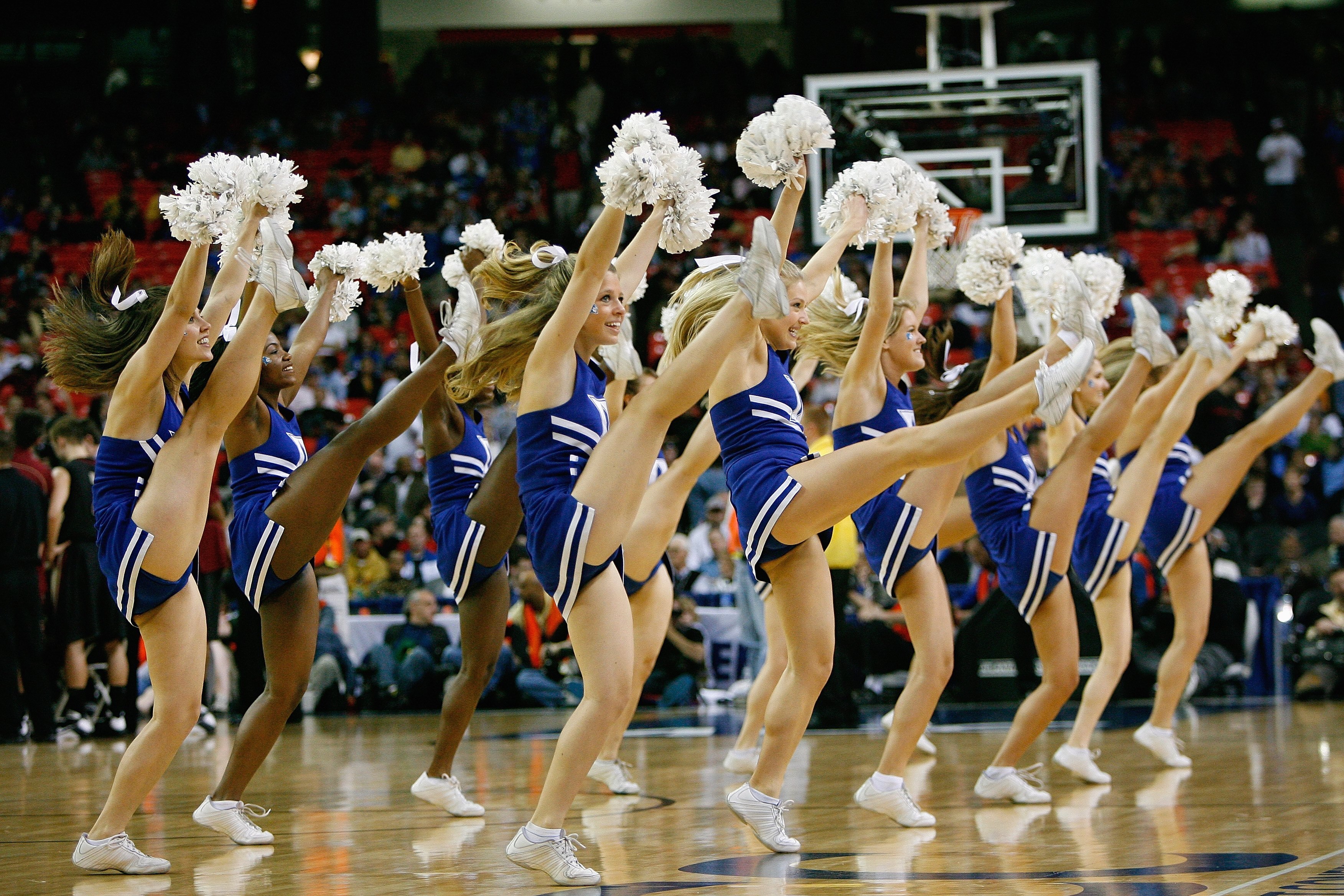 ATLANTA - MARCH 15:  The Duke Blue Devils cheerleaders perform against the Florida State Seminoles during the championship game of the 2009 ACC Men's Basketball Tournament on March 15, 2009 at the Georgia Dome in Atlanta, Georgia.  (Photo by Kevin C. Cox/