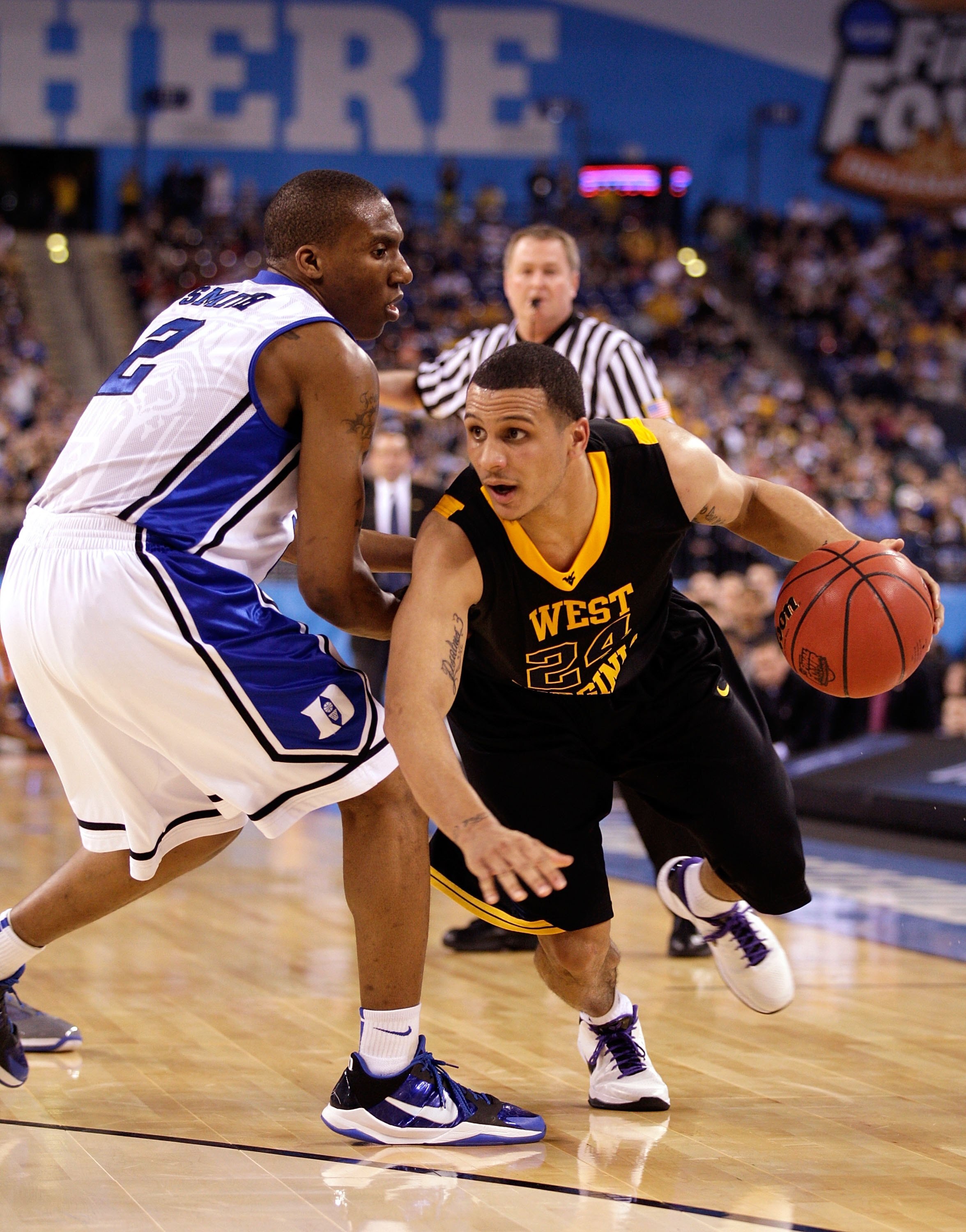 INDIANAPOLIS - APRIL 03:  Joe Mazzulla #24 of the West Virginia Mountaineers moves the ball while taking on the Duke Blue Devils during the National Semifinal game of the 2010 NCAA Division I Men's Basketball Championship at Lucas Oil Stadium on April 3,