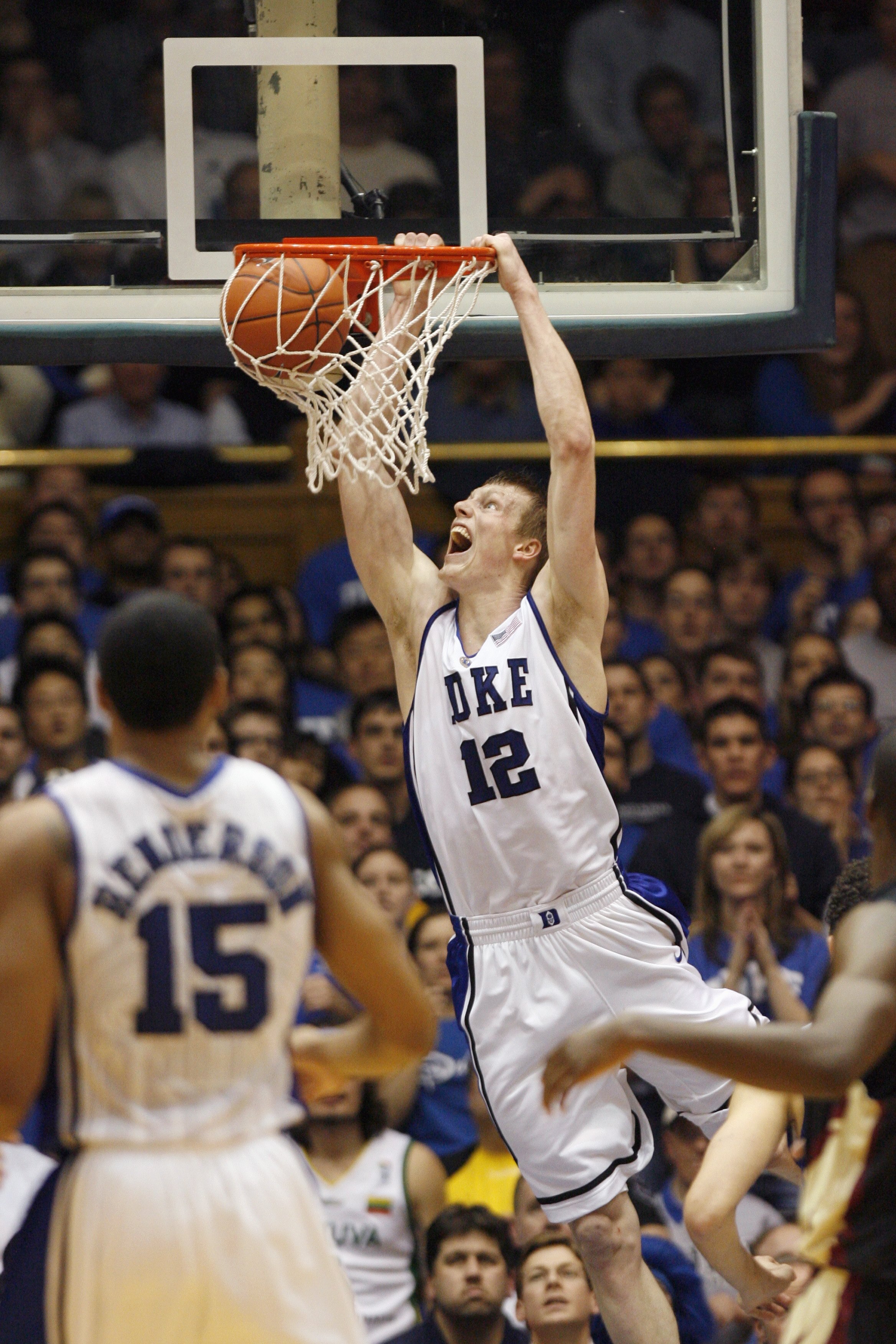 DURHAM, NC - MARCH 03:  Kyle Singler #12 of the Duke Blue Devils dunks against the Florida State Seminoles during the game on March 3, 2009 at Cameron Indoor Stadium in Durham, North Carolina.  (Photo by Kevin C. Cox/Getty Images)