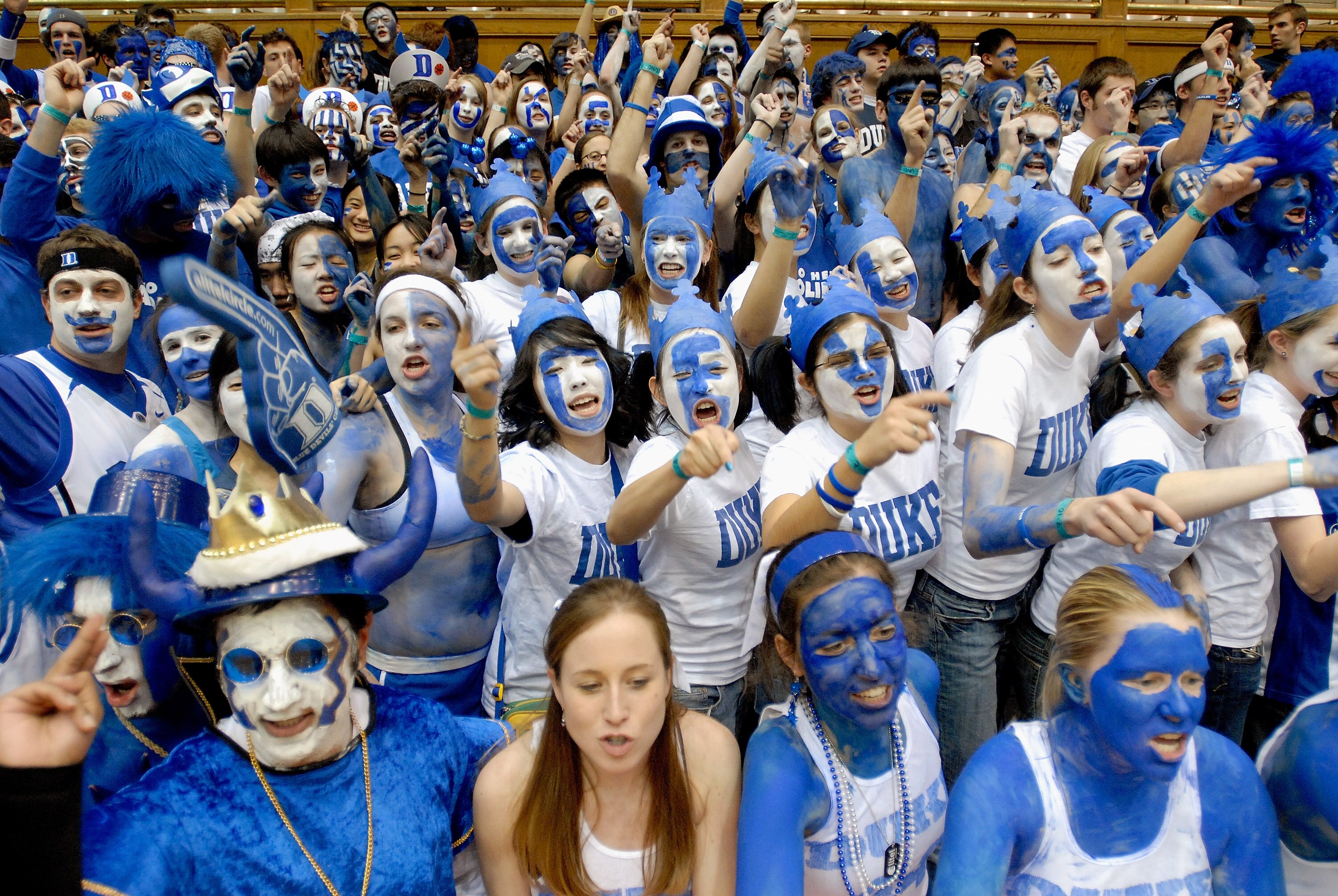 DURHAM, NC - FEBRUARY 07:  Fans cheer as they wait for the start of a game between the Duke Blue Devils and the North Carolina Tar Heels on February 7, 2007 at Cameron Indoor Stadium in Durham, North Carolina.  (Photo by Grant Halverson/Getty Images)