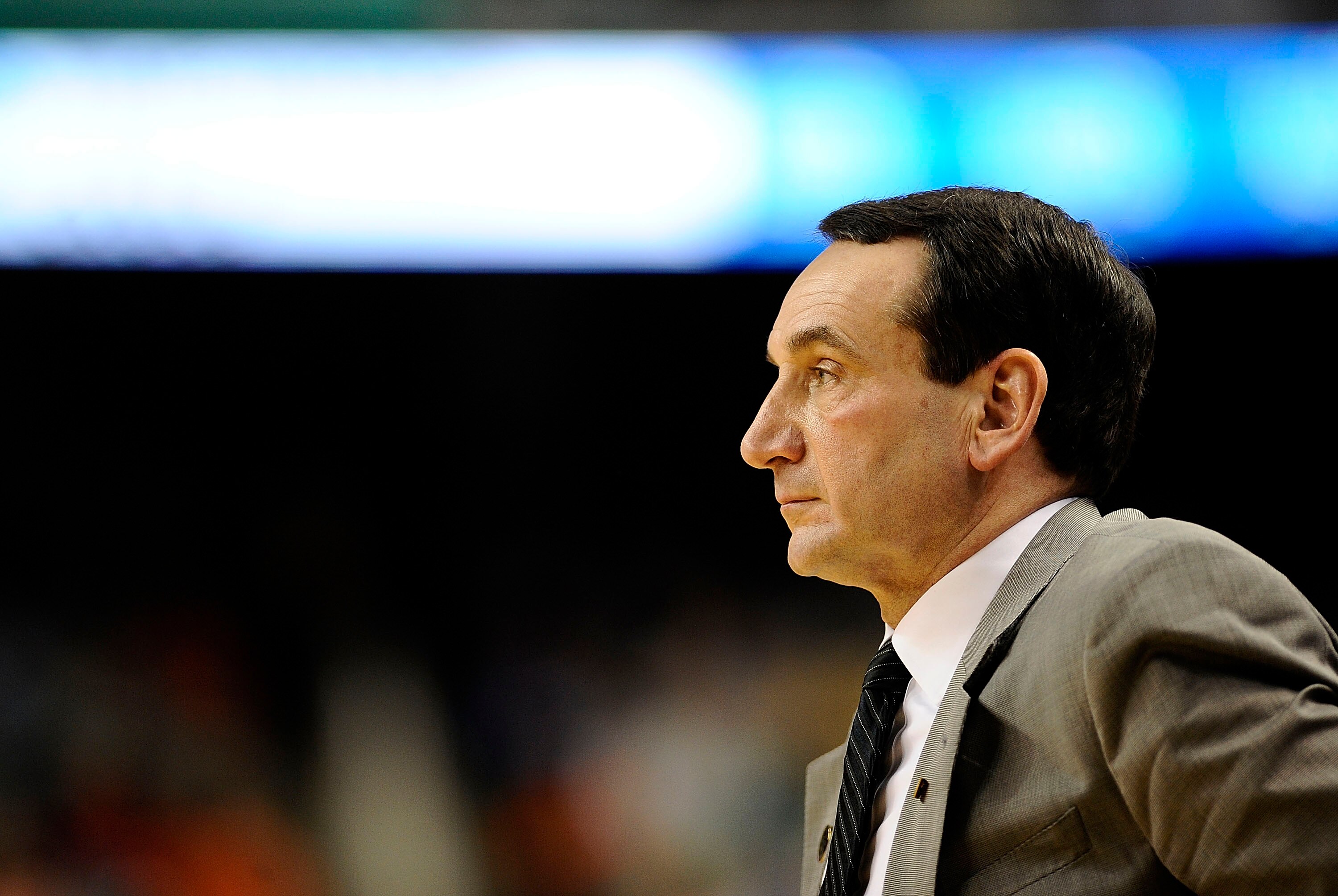 GREENSBORO, NC - MARCH 12:  Head coach Mike Krzyzewski of the Duke Blue Devils walks the bench against  the University of Virginia Cavaliers in their quarterfinal game in the 2010 ACC Men's Basketball Tournament at the Greensboro Coliseum on March 12, 201