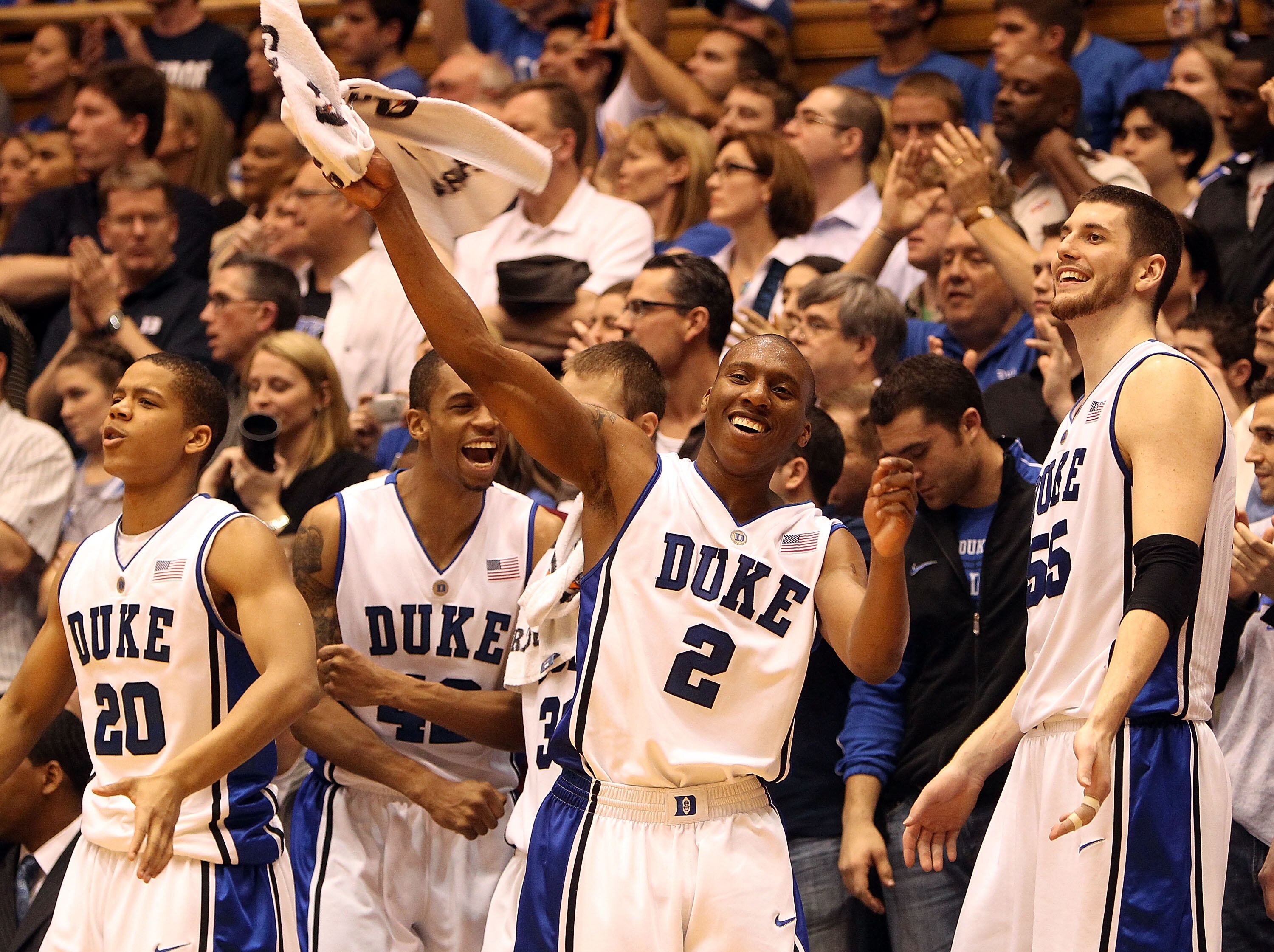 DURHAM, NC - MARCH 06:  Nolan Smith #2 of the Duke Blue Devils celebrates with teammates on the bench during their 82-50 victory over the North Carolina Tar Heels during their game at Cameron Indoor Stadium on March 6, 2010 in Durham, North Carolina.  (Ph