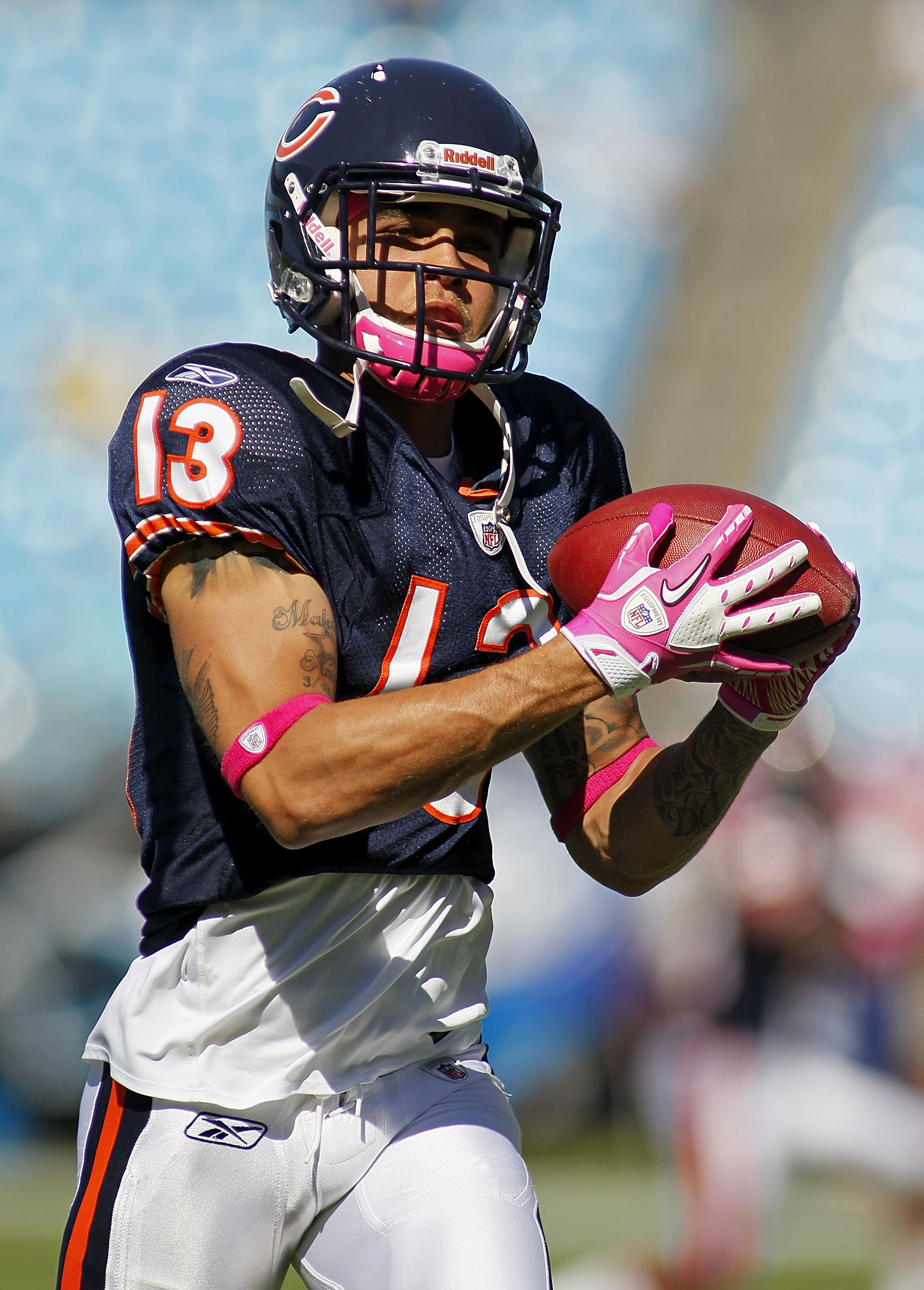 CHARLOTTE, NC - OCTOBER 10: Wide receiver Johnny Knox #13 of the Chicago Bears catches the ball during warm ups prior to the Bears game against the Carolina Panthers at Bank of America Stadium on October 10, 2010 in Charlotte, North Carolina. (Photo by Ge