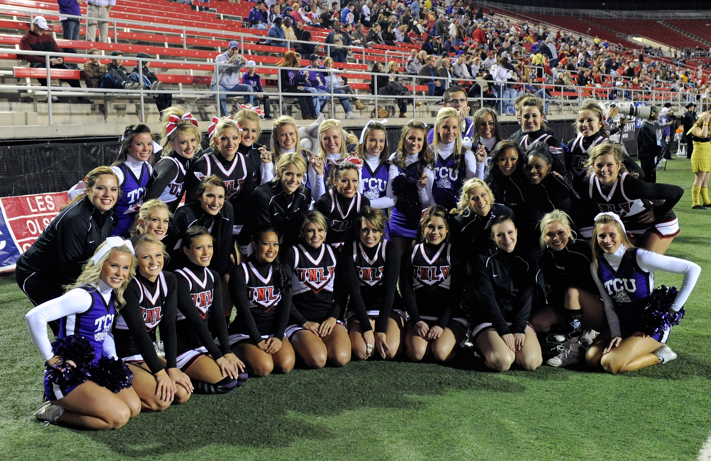 LAS VEGAS - OCTOBER 30:  Cheerleaders from the UNLV Rebels and the Texas Christian University Horned Frogs pose together for photos before the teams' game at Sam Boyd Stadium October 30, 2010 in Las Vegas, Nevada. TCU won 48-6.  (Photo by Ethan Miller/Get
