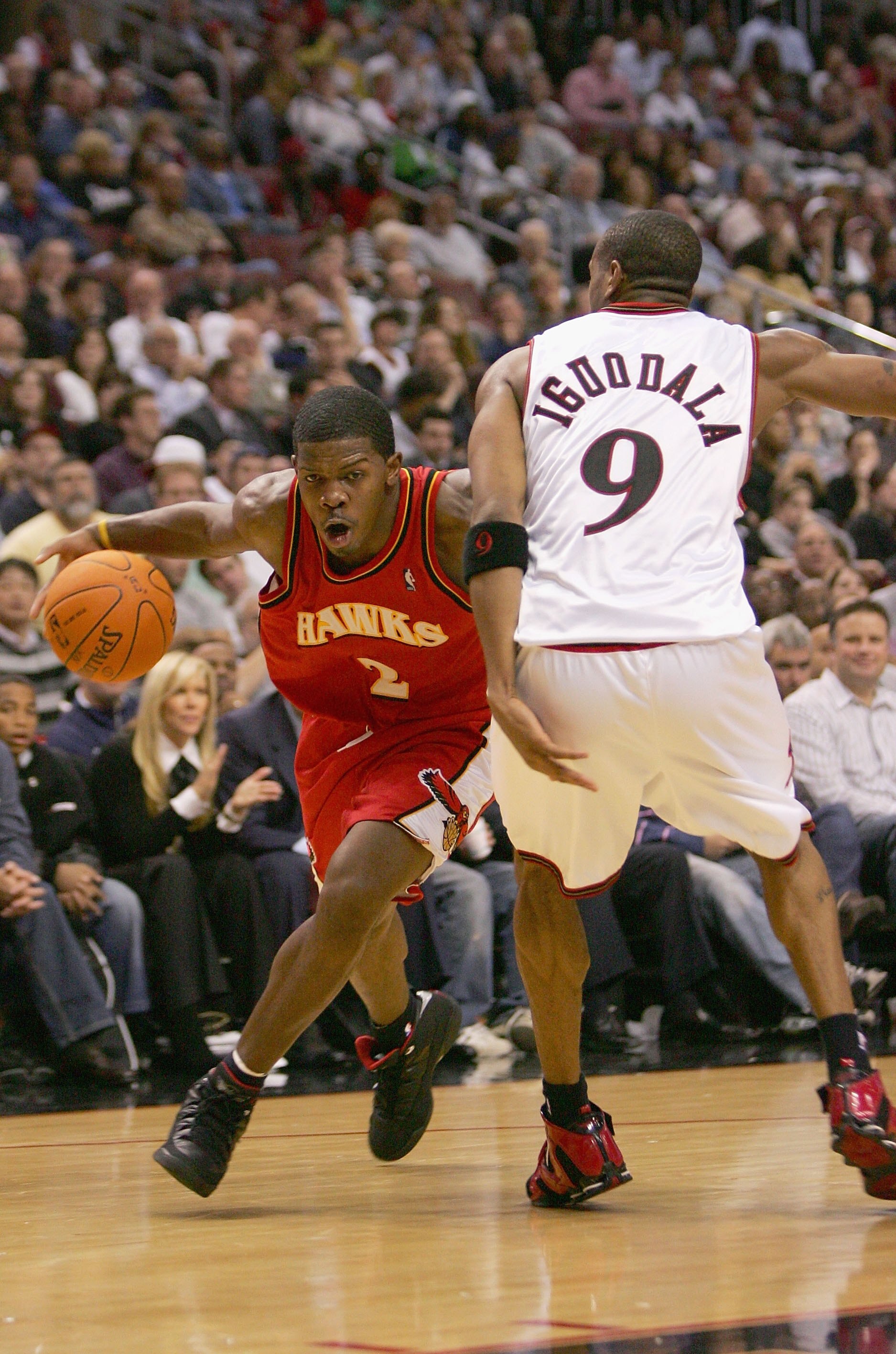 PHILADELPHIA - NOVEMBER 1:  Joe Johnson #2 of the Atlanta Hawks goes up against Andre Iguodala #9 of the Philadelphia 76ers during the game on November 1, 2006 at the Wachovia Center in Philadelphia, Pennsylvania.  The 76ers won 88-75.  NOTE TO USER: User