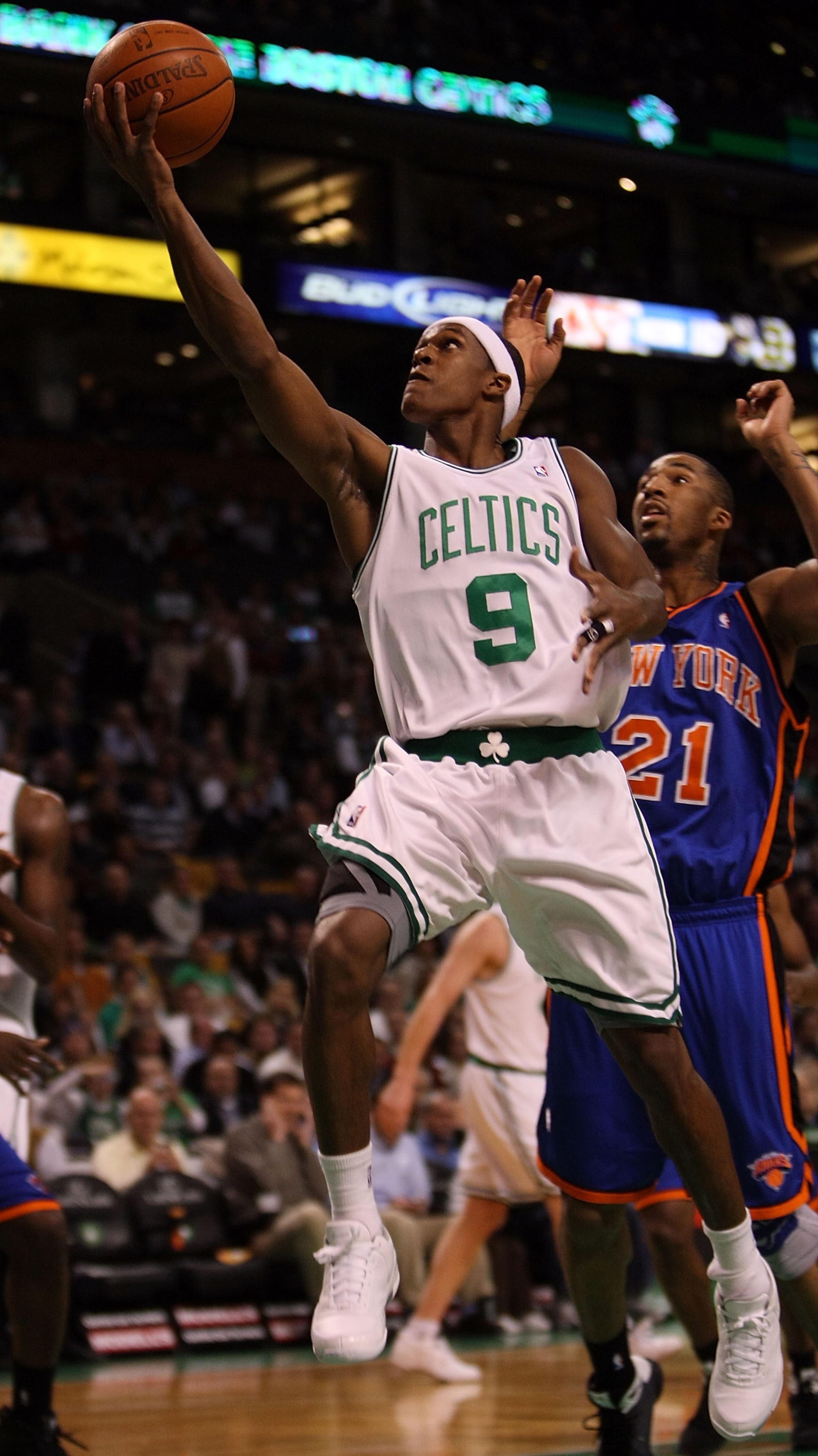 BOSTON - NOVEMBER 18: Rajon Rondo #9 of the Boston Celtics drives for the net past Wilson Chandler #21 of the New York Knicks on November 18, 2008 at TD Banknorth Garden in Boston, Massachusetts. NOTE TO USER: User expressly acknowledges and agrees that BOSTON - NOVEMBER 18: Rajon Rondo #9 of the Boston Celtics drives for the net past Wilson Chandler #21 of the New York Knicks on November 18, 2008 at TD Banknorth Garden in Boston, Massachusetts. NOTE TO USER: User expressly acknowledges and agrees that