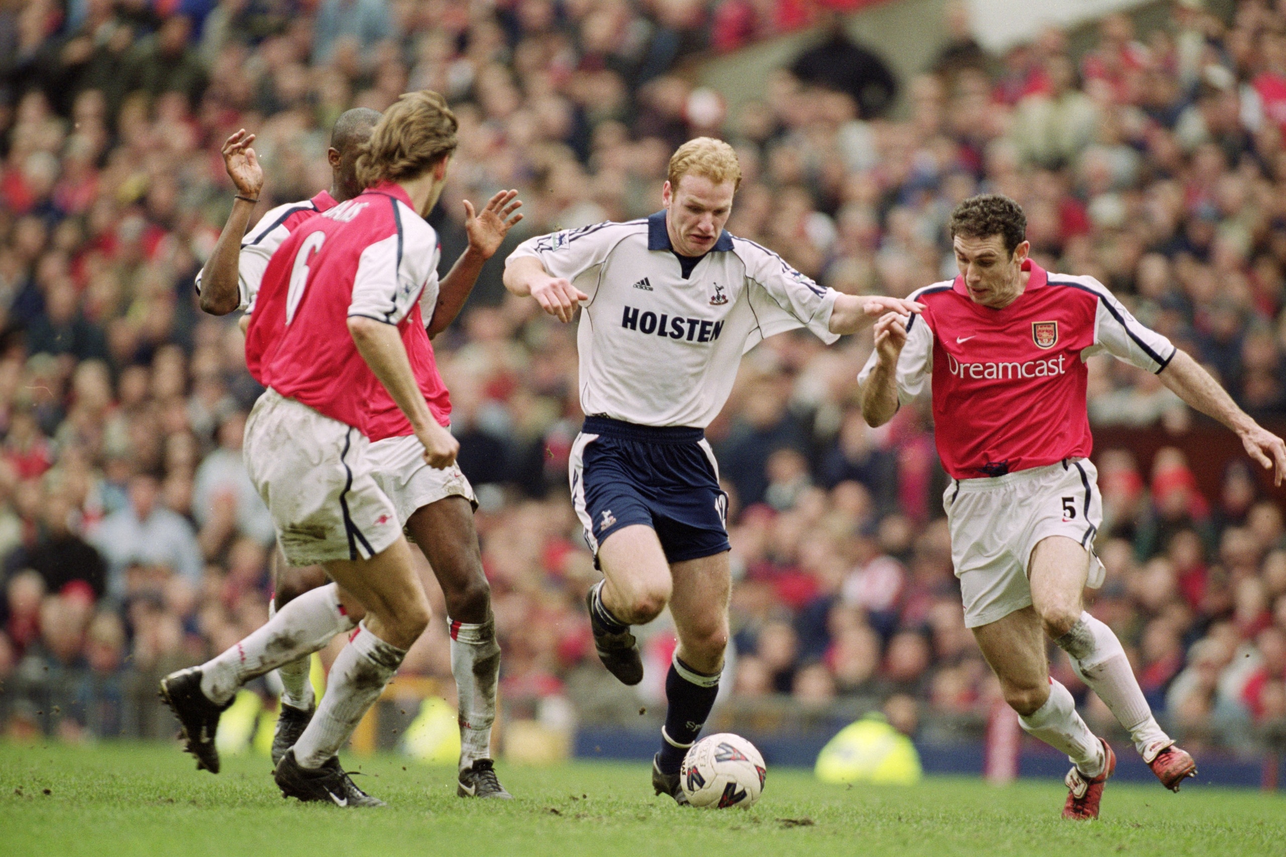 8 Apr 2001: Gary Doherty of Tottenham Hotspur takes the ball past Tony Adams (left), Patrick Vieira (centre) and Martin Keown (right) of Arsenal during the AXA sponsored FA Cup Semi-Final match played at Old Trafford, in Manchester, England. Arsenal wont 8 Apr 2001: Gary Doherty of Tottenham Hotspur takes the ball past Tony Adams (left), Patrick Vieira (centre) and Martin Keown (right) of Arsenal during the AXA sponsored FA Cup Semi-Final match played at Old Trafford, in Manchester, England. Arsenal wont