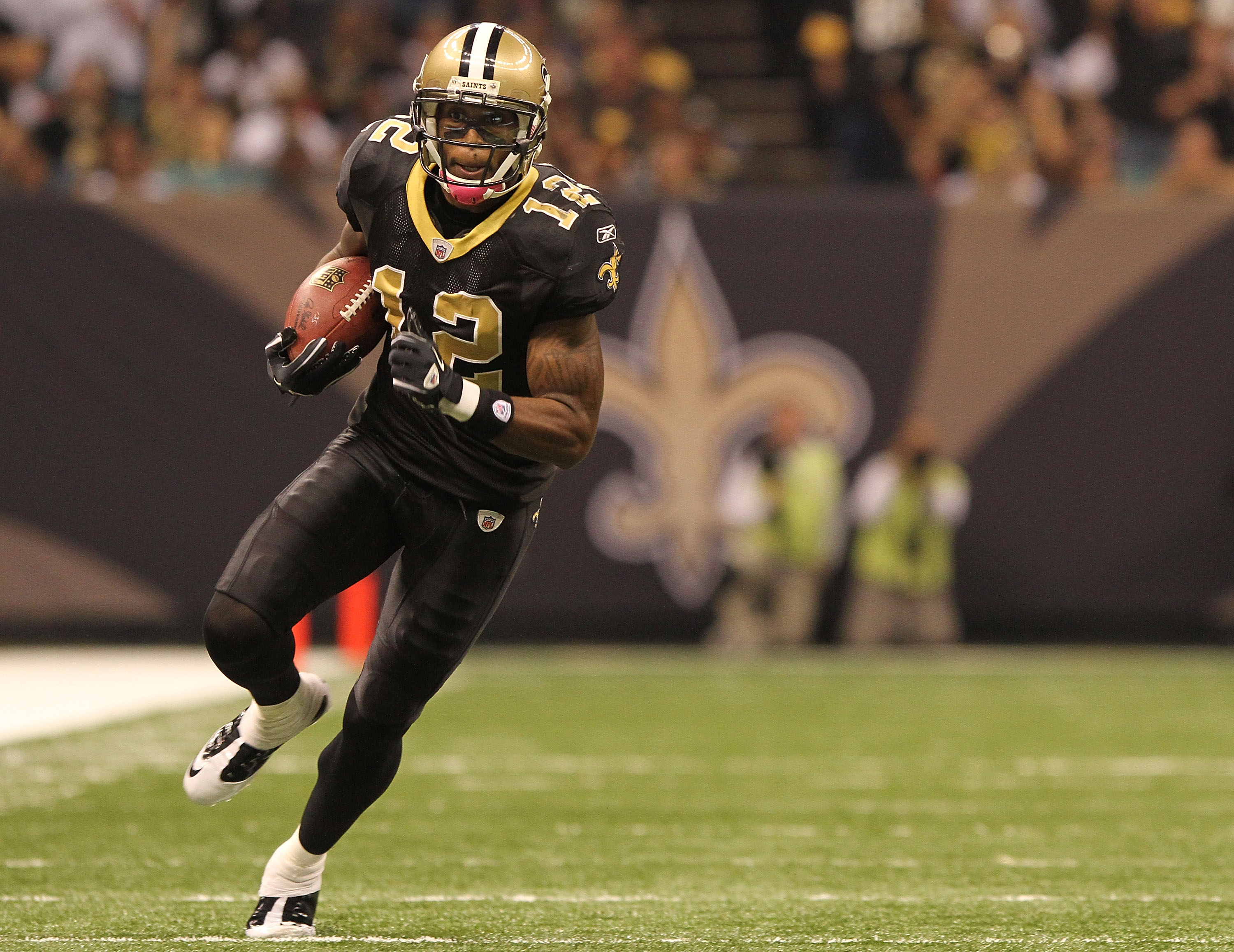 NEW ORLEANS - OCTOBER 31: Marques Colston #12 of the New Orleans Saints hauls in a pass during the game against the Pittsburgh Steelers at the Louisiana Superdome on October 31, 2010 in New Orleans, Louisiana. (Photo by Matthew Sharpe/Getty Images)