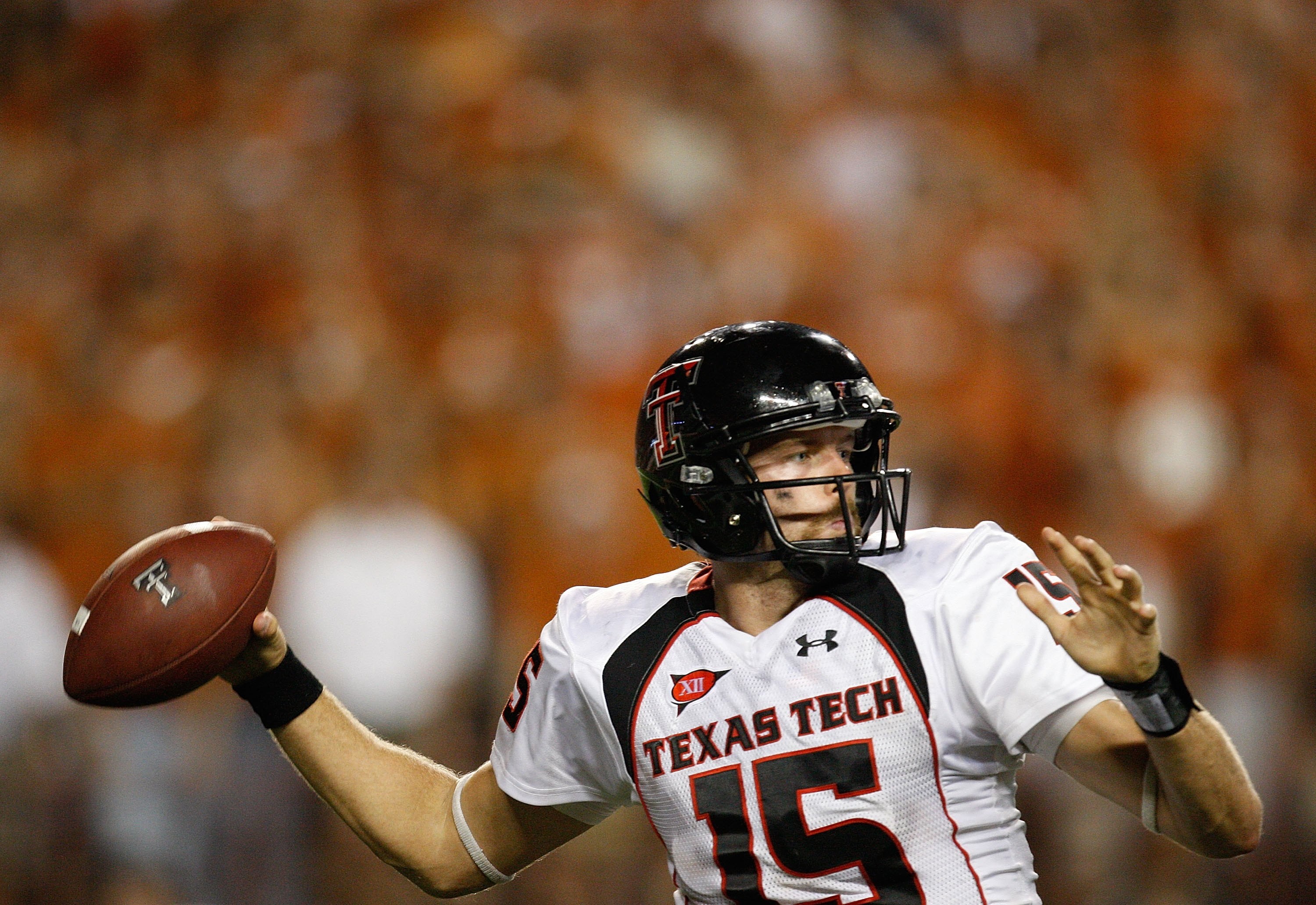 AUSTIN, TX - SEPTEMBER 19:  Quarterback Taylor Potts #15 of the Texas Tech Red Raiders drops back to pass against the Texas Longhorns at Darrell K Royal-Texas Memorial Stadium on September 19, 2009 in Austin, Texas.  (Photo by Ronald Martinez/Getty Images