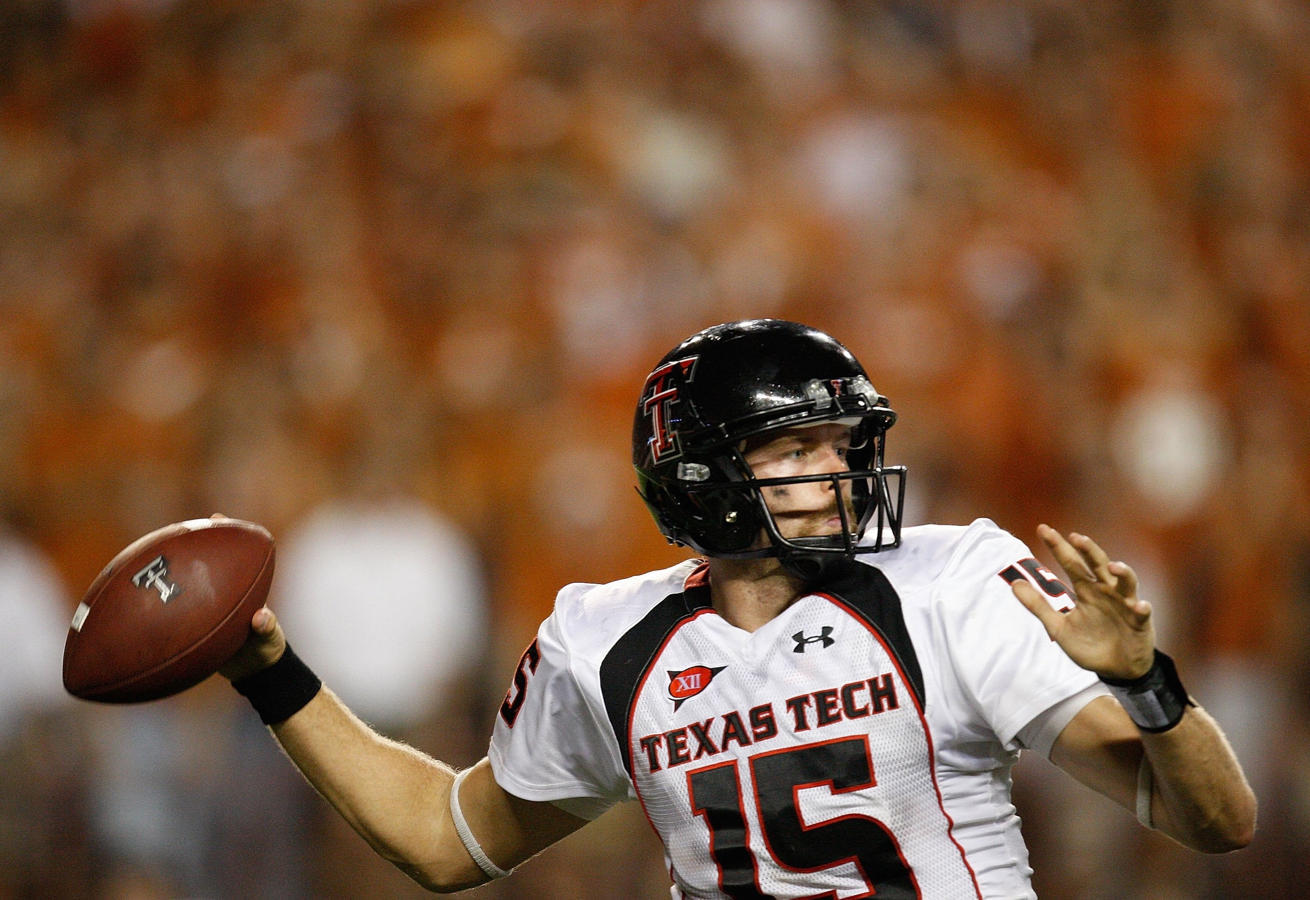 AUSTIN, TX - SEPTEMBER 19: Quarterback Taylor Potts #15 of the Texas Tech Red Raiders drops back to pass against the Texas Longhorns at Darrell K Royal-Texas Memorial Stadium on September 19, 2009 in Austin, Texas. (Photo by Ronald Martinez/Getty Images AUSTIN, TX - SEPTEMBER 19: Quarterback Taylor Potts #15 of the Texas Tech Red Raiders drops back to pass against the Texas Longhorns at Darrell K Royal-Texas Memorial Stadium on September 19, 2009 in Austin, Texas. (Photo by Ronald Martinez/Getty Images