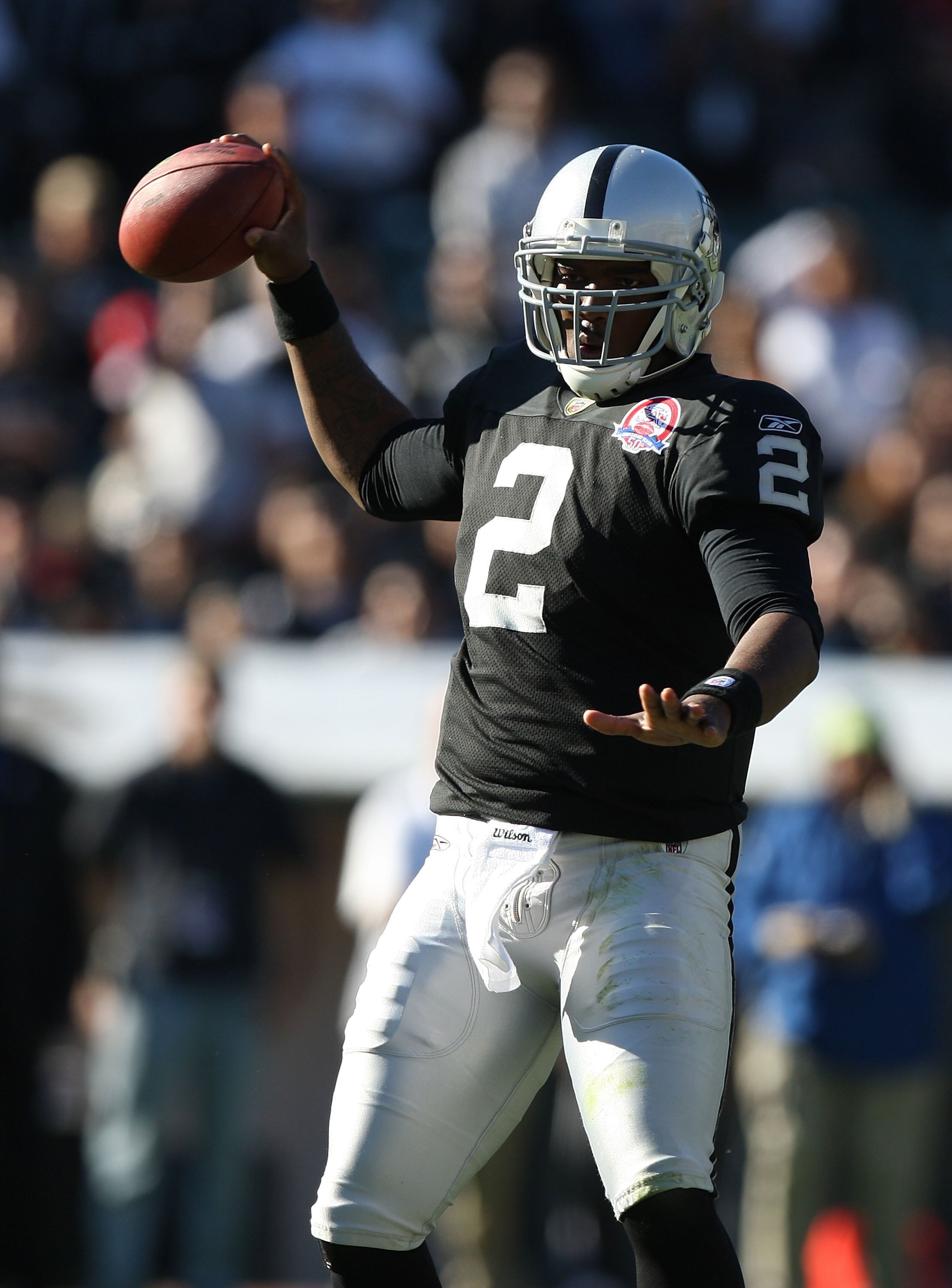 OAKLAND, CA - NOVEMBER 15:  JaMarcus Russell #2 of the Oakland Raiders passes against the Kansas City Chiefs during an NFL game at Oakland-Alameda County Coliseum on November 15, 2009 in Oakland, California.  (Photo by Jed Jacobsohn/Getty Images)