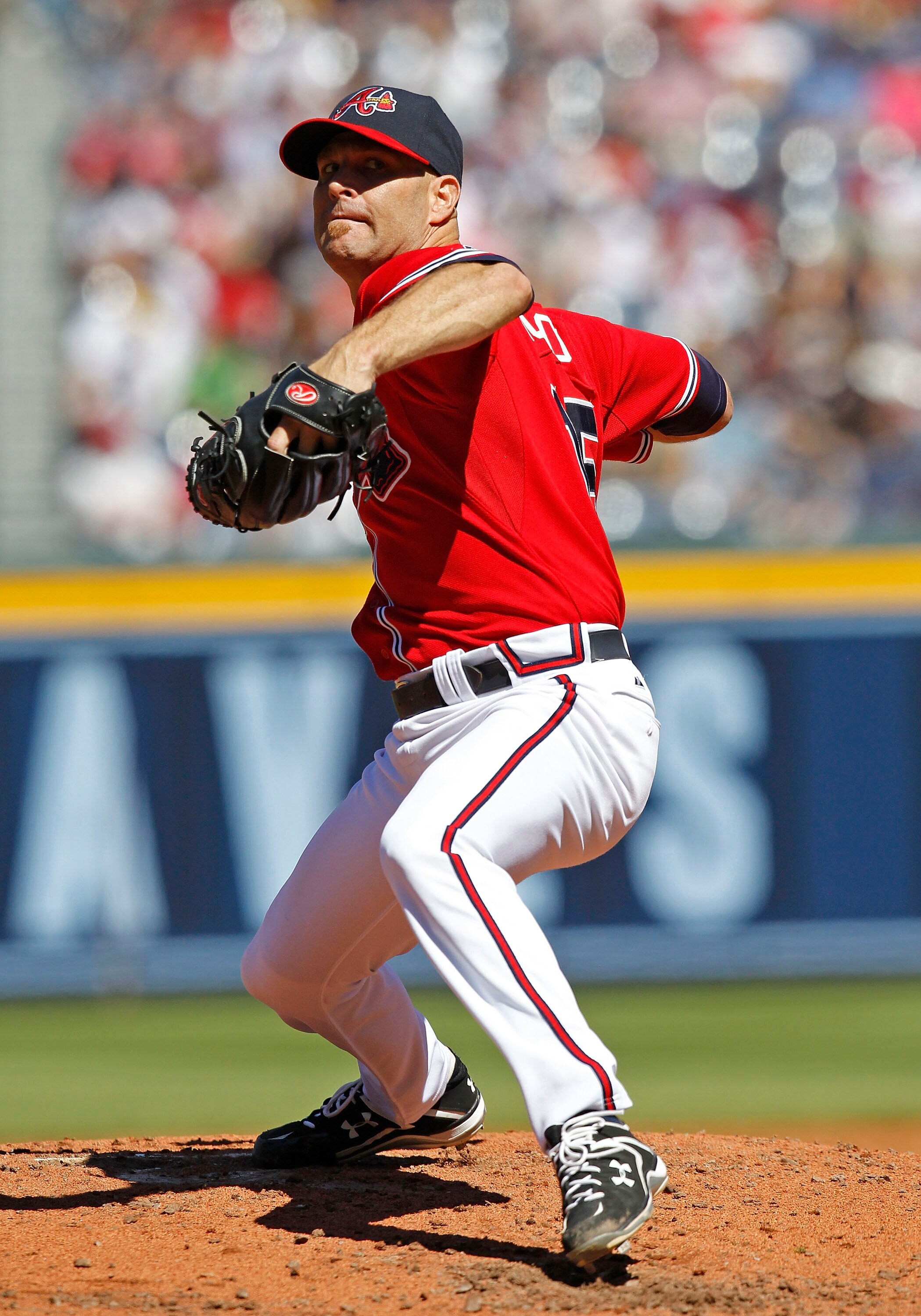 ATLANTA - OCTOBER 03:  Pitcher Tim Hudson #15 of the Atlanta Braves throws a pitch during the game against the Philadelphia Phillies at Turner Field on October 3, 2010 in Atlanta, Georgia.  The Braves beat the Phillies 8-7.  (Photo by Mike Zarrilli/Getty