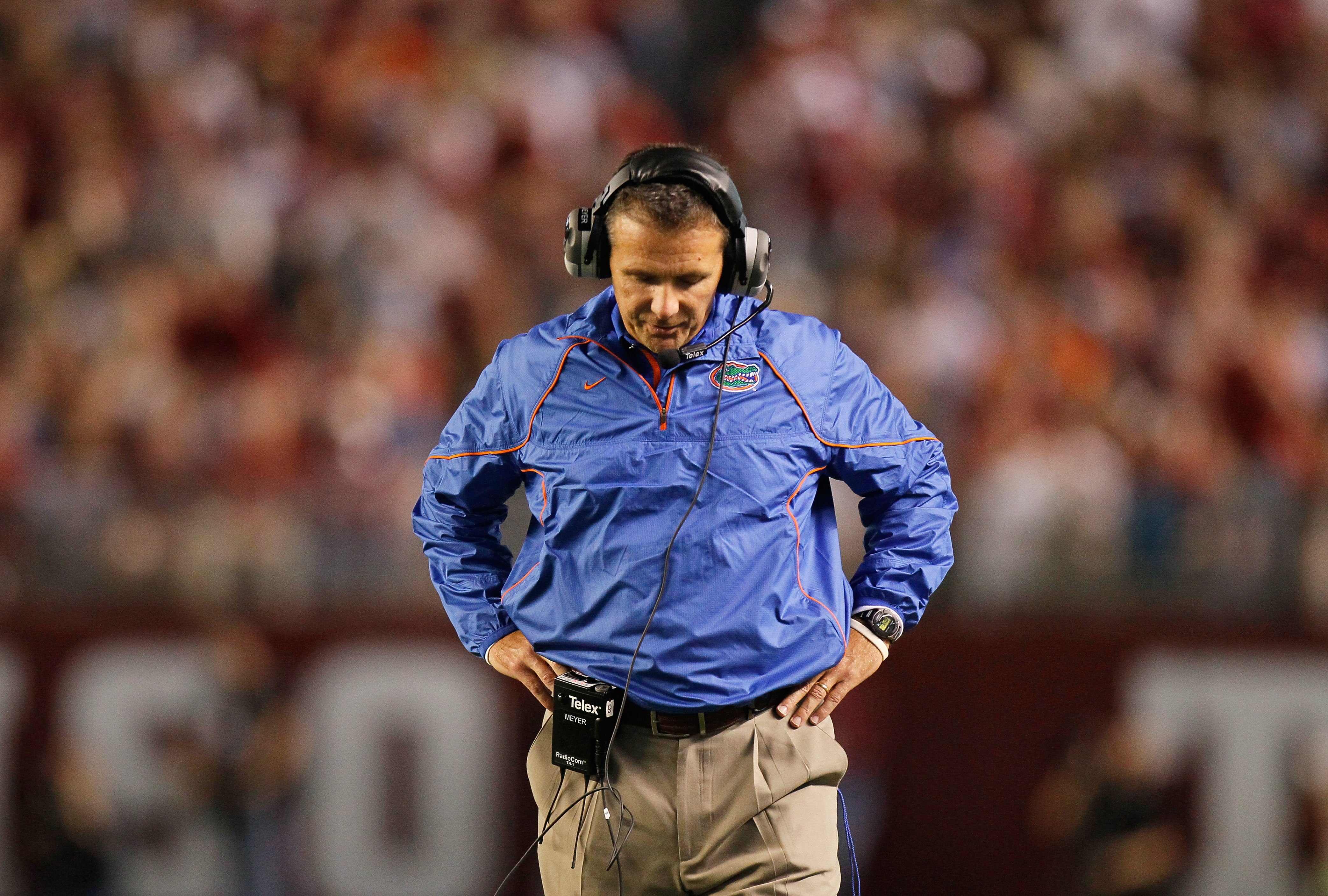 TUSCALOOSA, AL - OCTOBER 02:  Head coach Urban Meyer of the Florida Gators looks down at the ground on the sidelines during their game against the Alabama Crimson Tide at Bryant-Denny Stadium on October 2, 2010 in Tuscaloosa, Alabama.  (Photo by Kevin C.