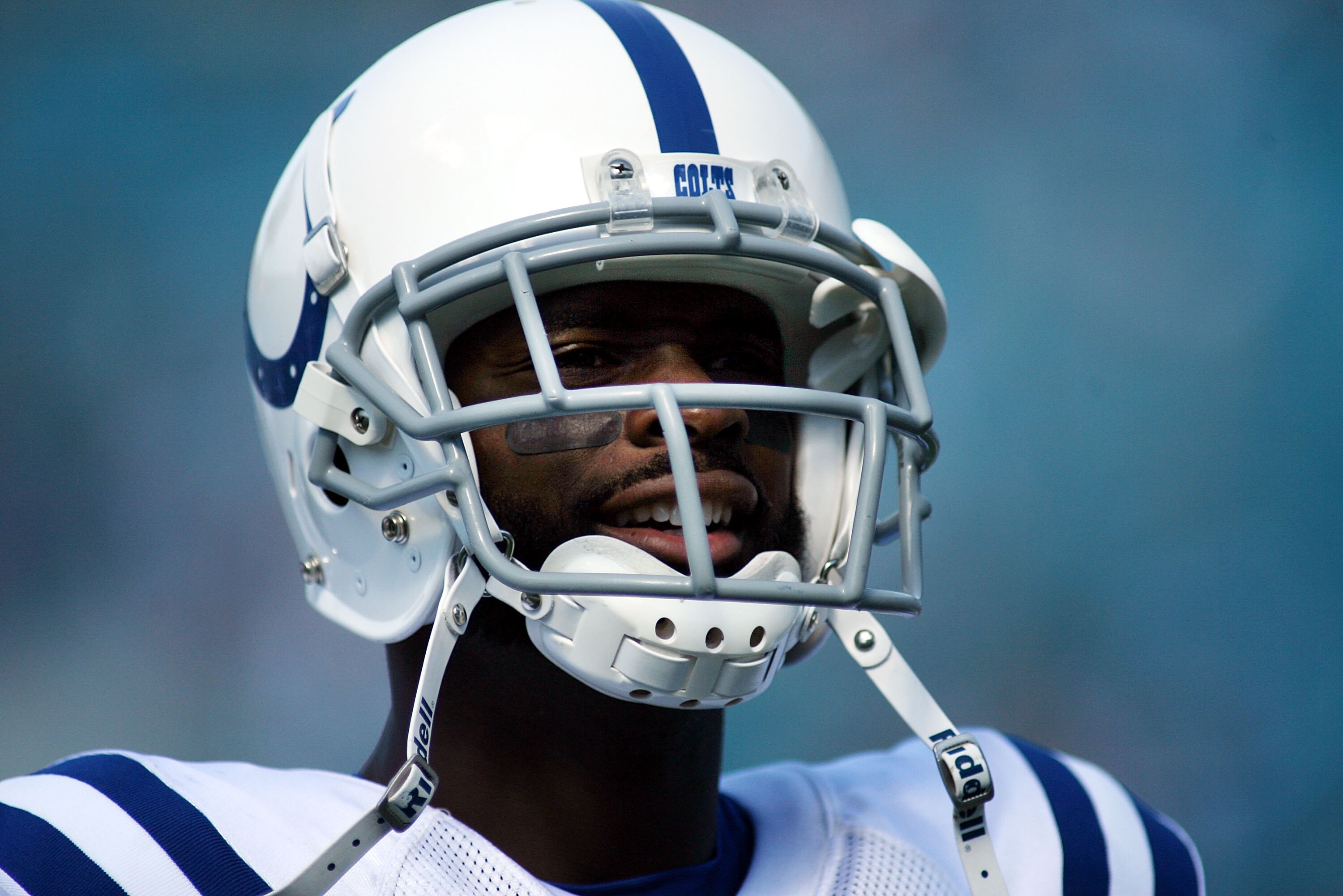 JACKSONVILLE, FL - OCTOBER 03:  Receiver Reggie Wayne #87 of the Indianapolis Colts stands on the sideloines while taking on the Jacksonville Jaguars at EverBank Field on October 3, 2010 in Jacksonville, Florida. The Jaguars won 31-28.  (Photo by Marc Ser