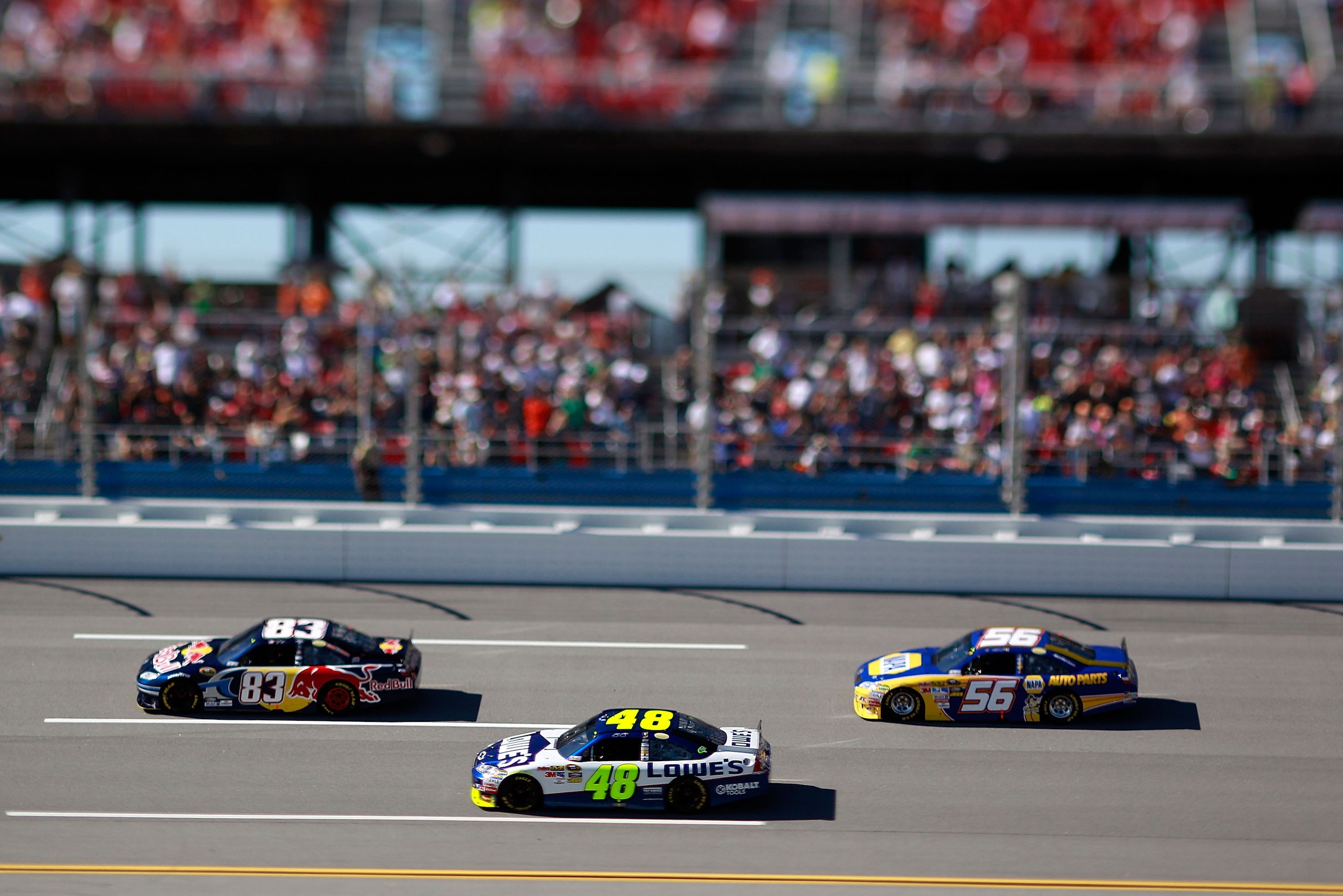 TALLADEGA, AL - OCTOBER 31: (***EDITORS NOTE*** - THIS DIGITAL IMAGE WAS CREATED WITH THE USE OF VARIABLE FOCAL PLANE LENS) Kasey Kahne, driver of the #83 Red Bull Toyota, leads a pack of cars during the NASCAR Sprint Cup Series AMP Energy Juice 500 at T TALLADEGA, AL - OCTOBER 31: (***EDITORS NOTE*** - THIS DIGITAL IMAGE WAS CREATED WITH THE USE OF VARIABLE FOCAL PLANE LENS) Kasey Kahne, driver of the #83 Red Bull Toyota, leads a pack of cars during the NASCAR Sprint Cup Series AMP Energy Juice 500 at T