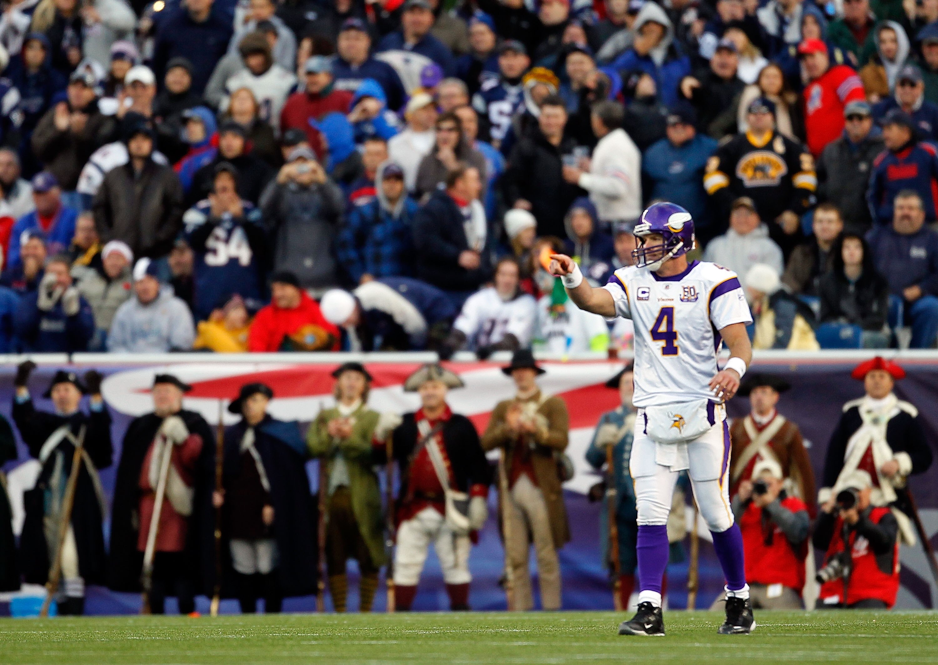 FOXBORO, MA - OCTOBER 31:  Brett Favre #4 of the Minnesota Vikings gestures against the New England Patriots at Gillette Stadium on October 31, 2010 in Foxboro, Massachusetts. (Photo by Jim Rogash/Getty Images)