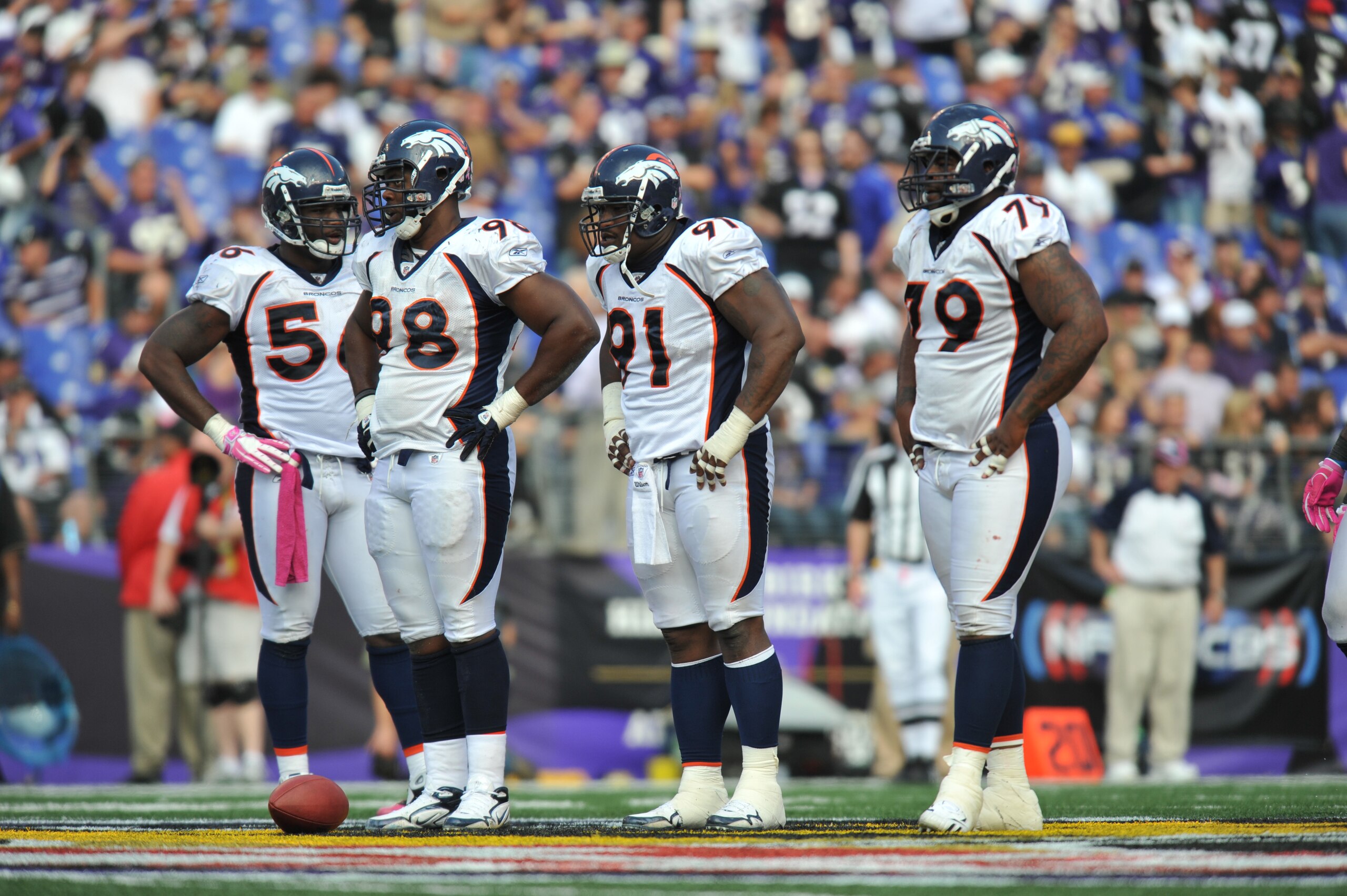 BALTIMORE, MD - OCTOBER 10: The Denver Broncos defense awaits the play during the game against the Baltimore Ravens at M&T Bank Stadium on October 10, 2010 in Baltimore, Maryland. Players wore pink in recognition of Breast Cancer Awareness Month. The Rave