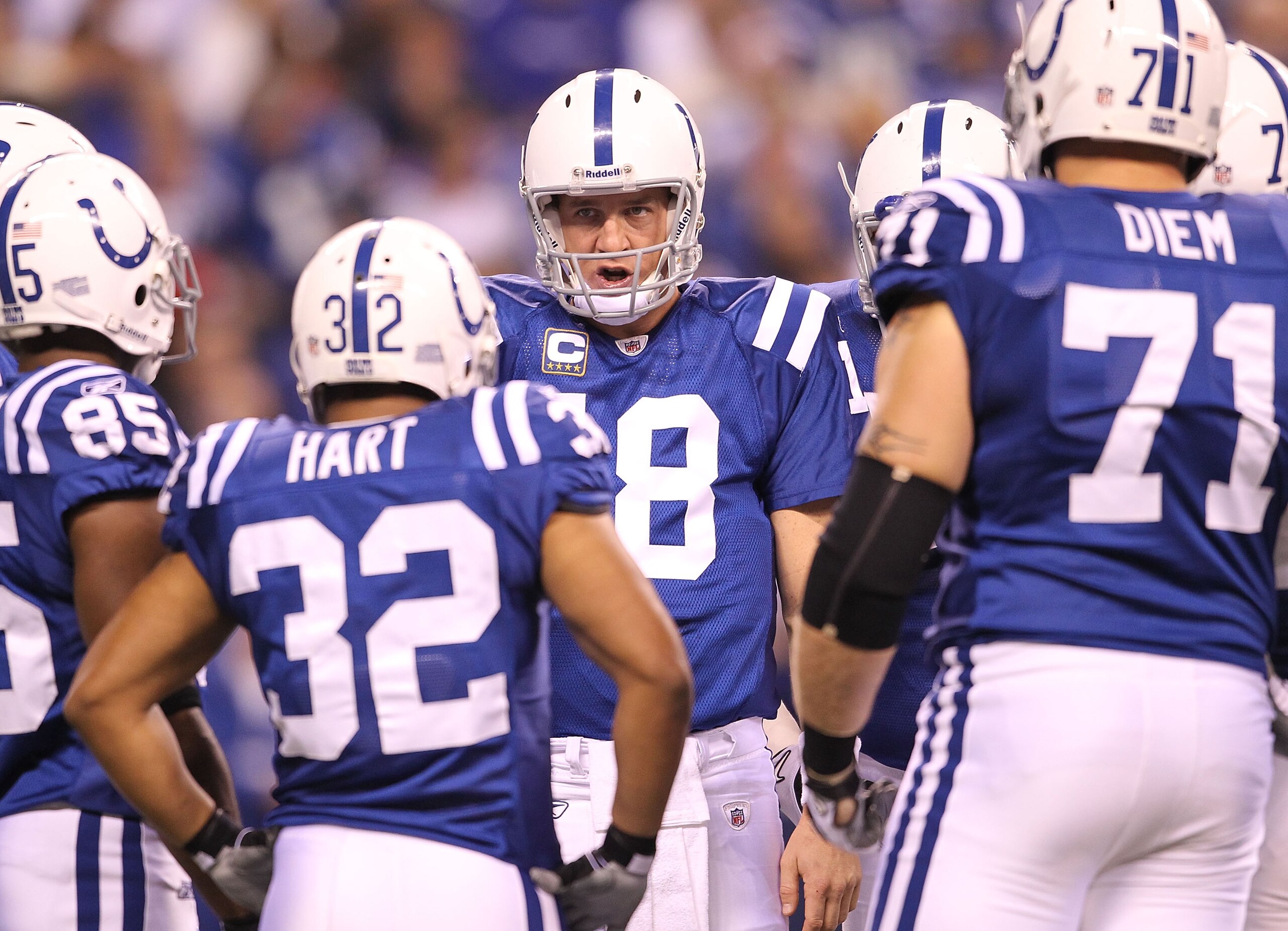 INDIANAPOLIS - NOVEMBER 01: Peyton Manning #18 of Indianapolis Colts gives instructions to his team in the hudlle during the NFL game against the Houston Texans at Lucas Oil Stadium on November 1, 2010 in Indianapolis, Indiana. (Photo by Andy Lyons/Get INDIANAPOLIS - NOVEMBER 01: Peyton Manning #18 of Indianapolis Colts gives instructions to his team in the hudlle during the NFL game against the Houston Texans at Lucas Oil Stadium on November 1, 2010 in Indianapolis, Indiana. (Photo by Andy Lyons/Get