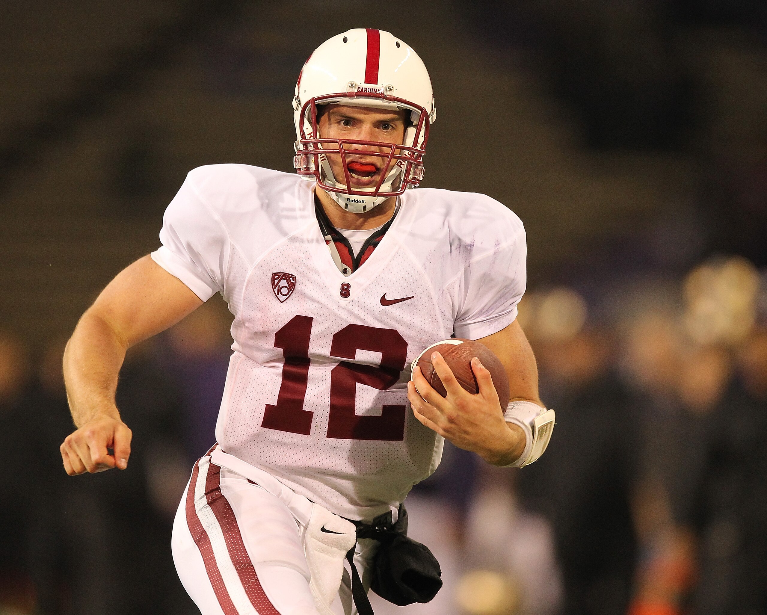 SEATTLE - OCTOBER 30:  Quarterback Andrew Luck #12 of the Stanford Cardinal rushes against the Washington Huskies on October 30, 2010 at Husky Stadium in Seattle, Washington. Stanford defeated Washington 41-0. (Photo by Otto Greule Jr/Getty Images)