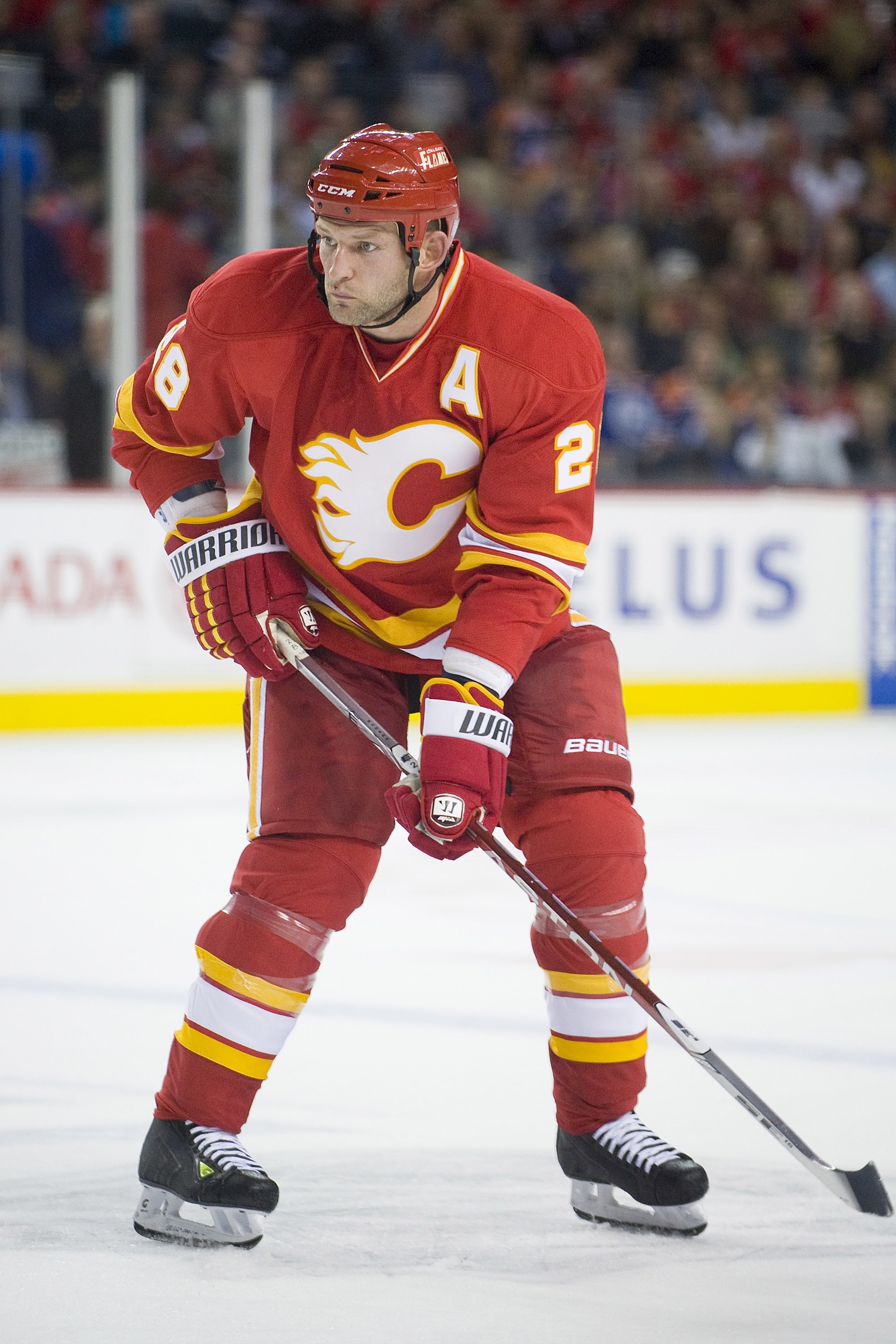 EDMONTON, CANADA - OCTOBER 16:  Calgary Flames defenseman Robyn Regehr #28 mans the point against the Edmonton Oilers at the Scotiabank Saddledome  on October 16, 2010 in Calgary, Alberta, Canada.  The Flames beat the Oilers 5-3.  (Photo by Dylan Lynch/Ge