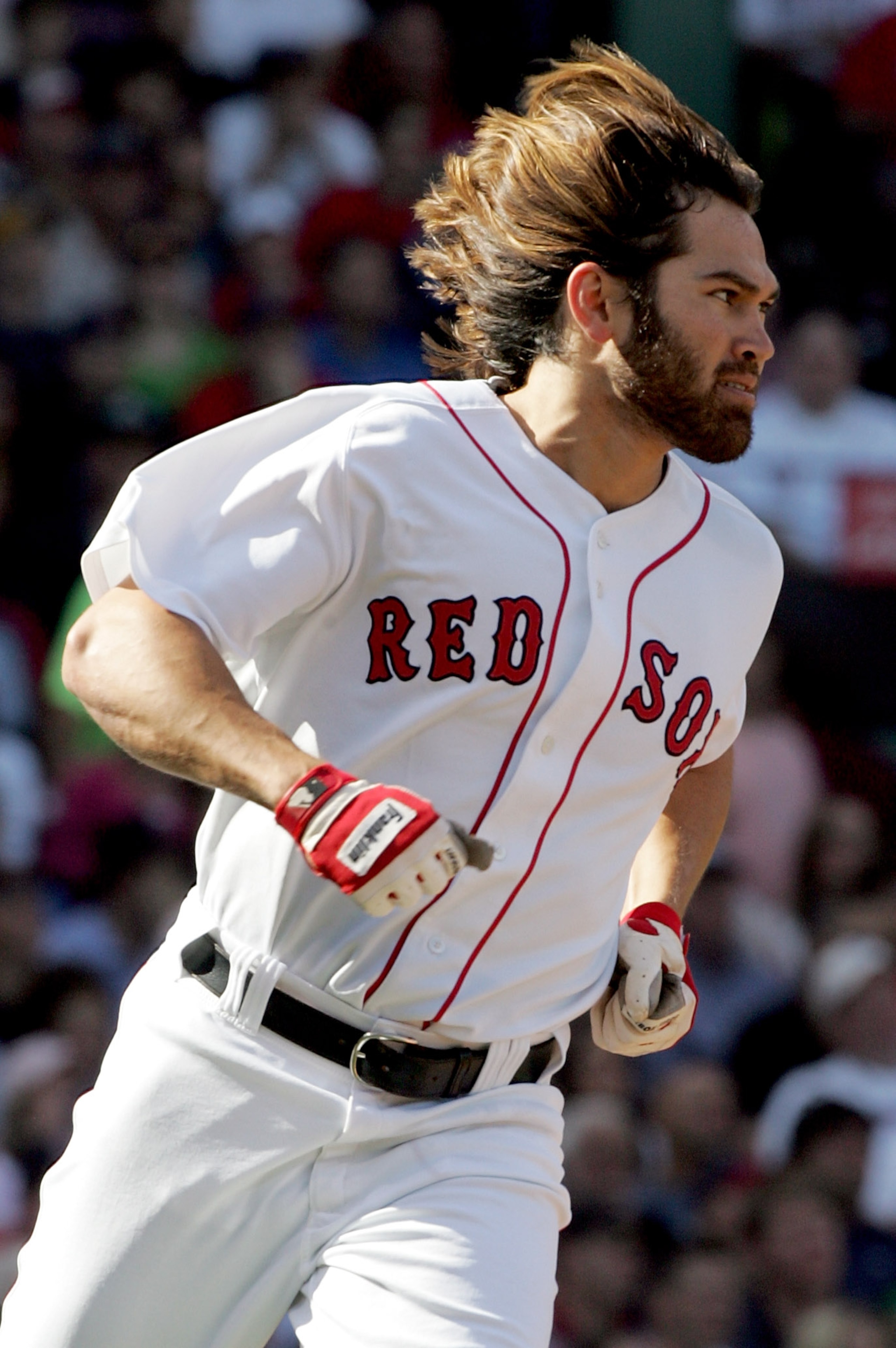 BOSTON - OCTOBER 02:  Johnny Damon #18 of the Boston Red Sox runs to first base during the game against the New York Yankees at Fenway Park on October 2, 2005 in Boston, Massachusetts.  (Photo by Jim McIsaac/Getty Images)
