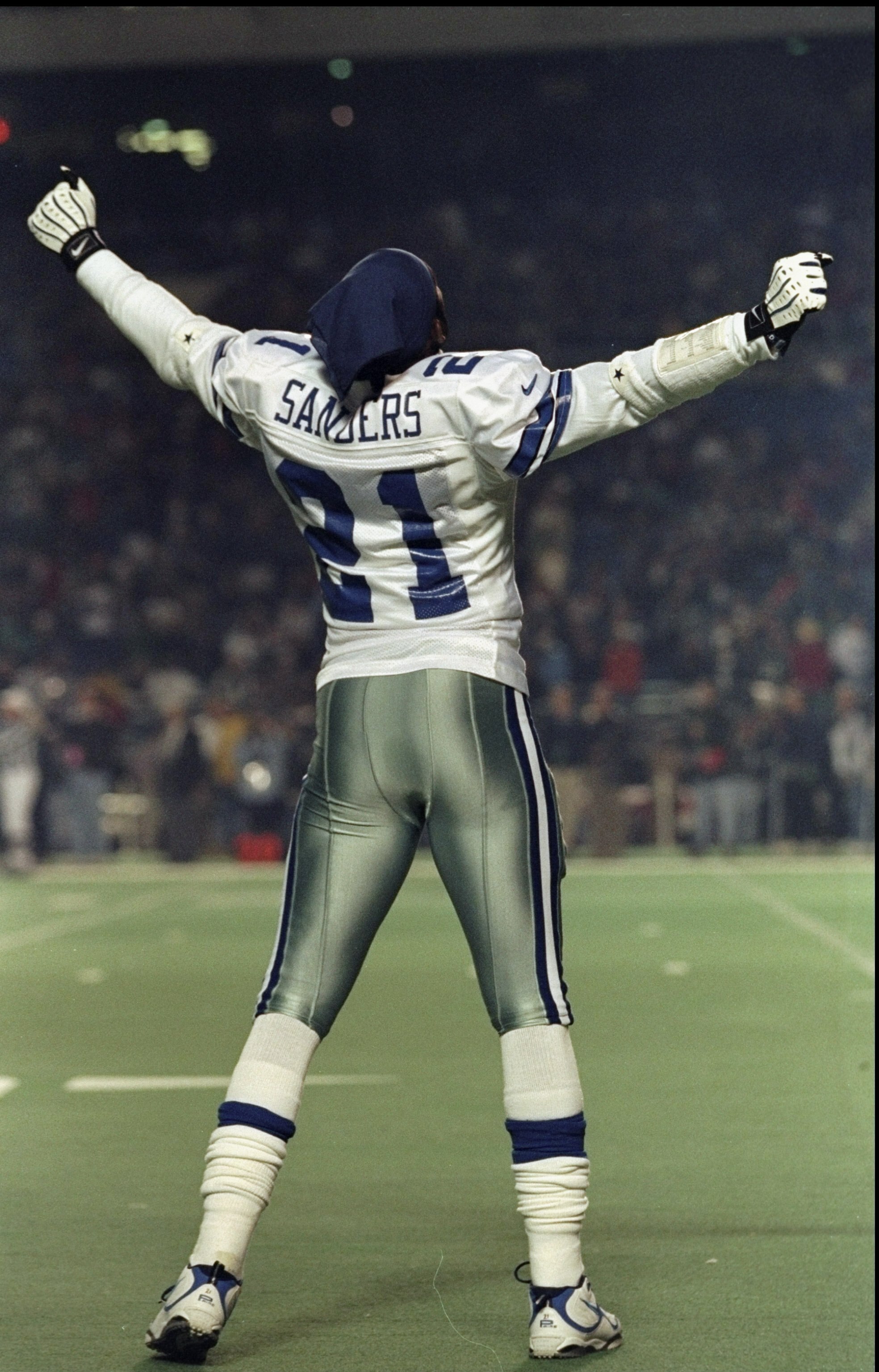 2 Nov 1998: Deion Sanders #21 of the Dallas Cowboys celebrates from the side-lines during a game against the Philadelphia Eagles at Veterans Stadium in Philadelphia, Pennsylvania. The Cowboys defeated the Eagles 34-0. Mandatory Credit: Jed Jacobsohn  /All