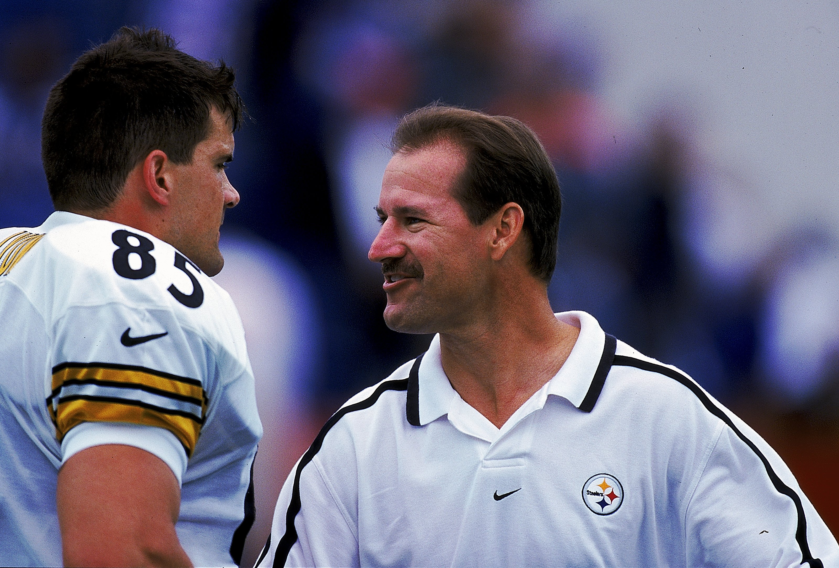10 Oct 1999:  Head Coach Bill Cowher of the Pittsburgh Steelers talking to Mitch Lyons #85 on the sidelines during the game against the Buffalo Bills at the Ralph Wilson Stadium in Orchard Park, New York. The Bills defeated the Steelers 24-21. Mandatory C