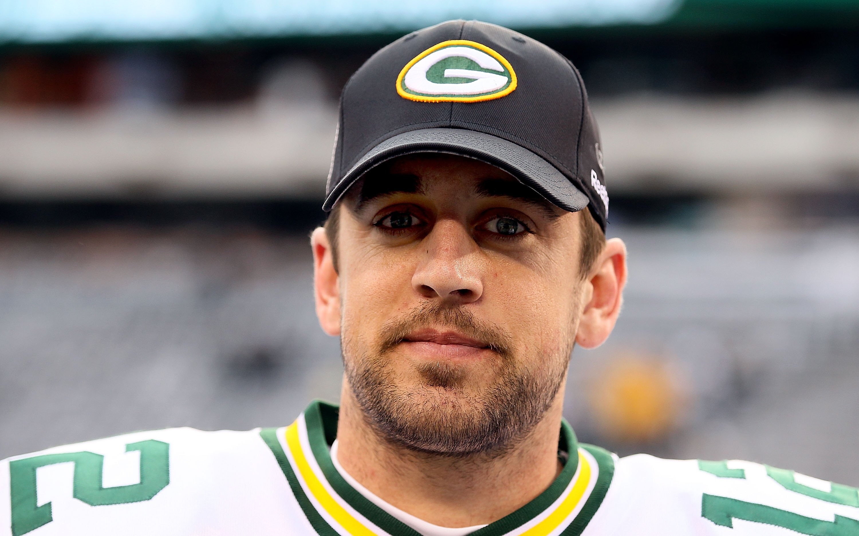 EAST RUTHERFORD, NJ - OCTOBER 31:  Aaron Rodgers #12 of the Green Bay Packers looks on against the New York Jets on October 31, 2010 at the New Meadowlands Stadium in East Rutherford, New Jersey.The Packers defeated the Jets 9-0.  (Photo by Jim McIsaac/Ge