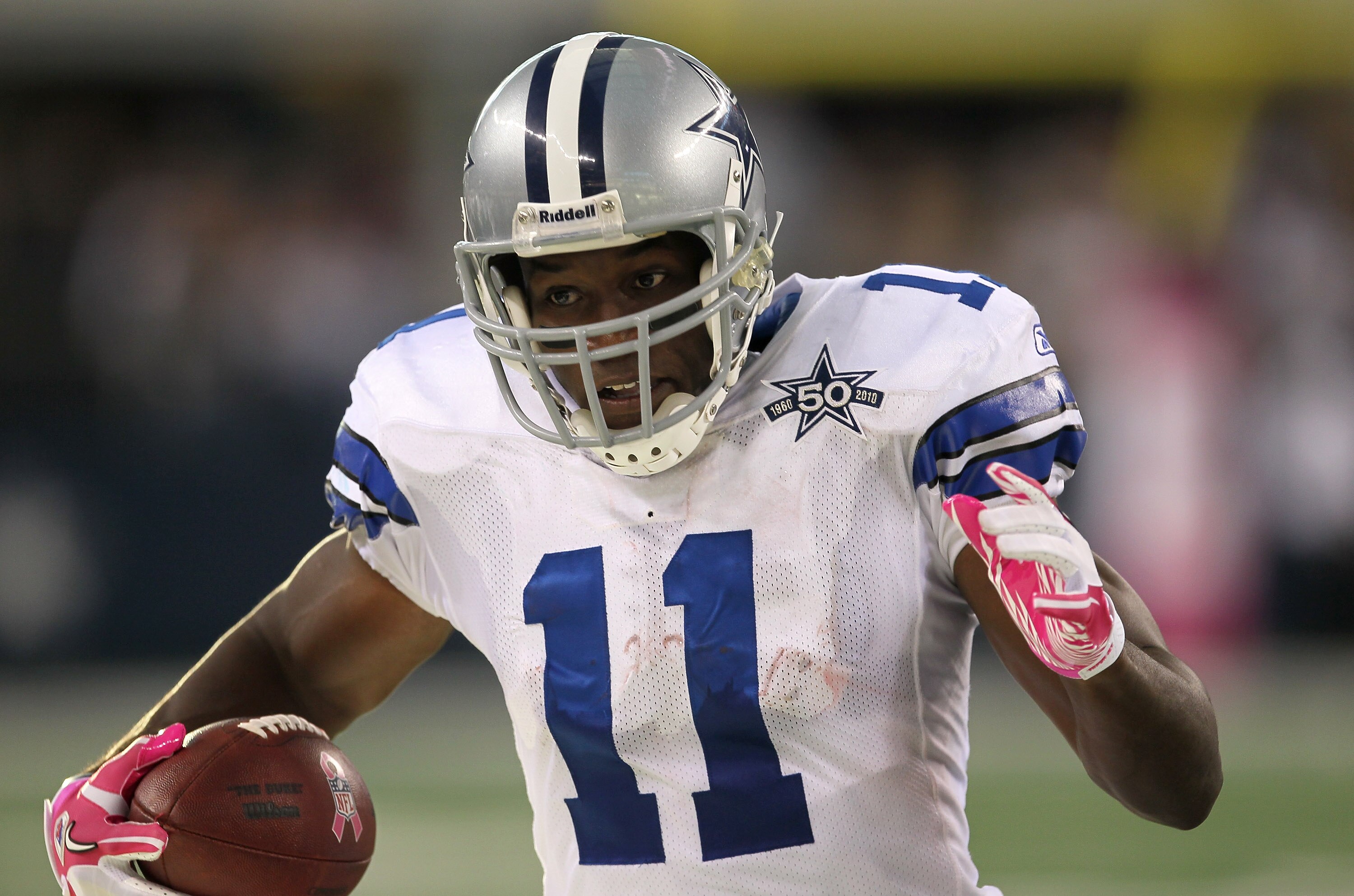 ARLINGTON, TX - OCTOBER 10:  Wide receiver Roy Williams #11 of the Dallas Cowboys carries the ball against the Tennessee Titans at Cowboys Stadium on October 10, 2010 in Arlington, Texas. The Titans won 34-27.  (Photo by Stephen Dunn/Getty Images)