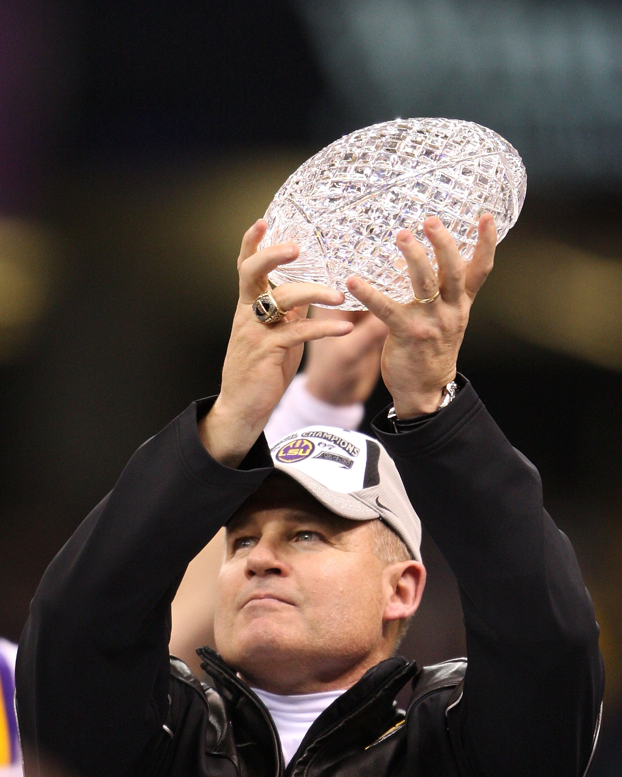 NEW ORLEANS - JANUARY 07:  Head coach Les Miles of the Louisiana State University Tigers holds the trophy after defeating the Ohio State Buckeyes 38-24 in the AllState BCS National Championship on January 7, 2008 at the Louisiana Superdome in New Orleans,