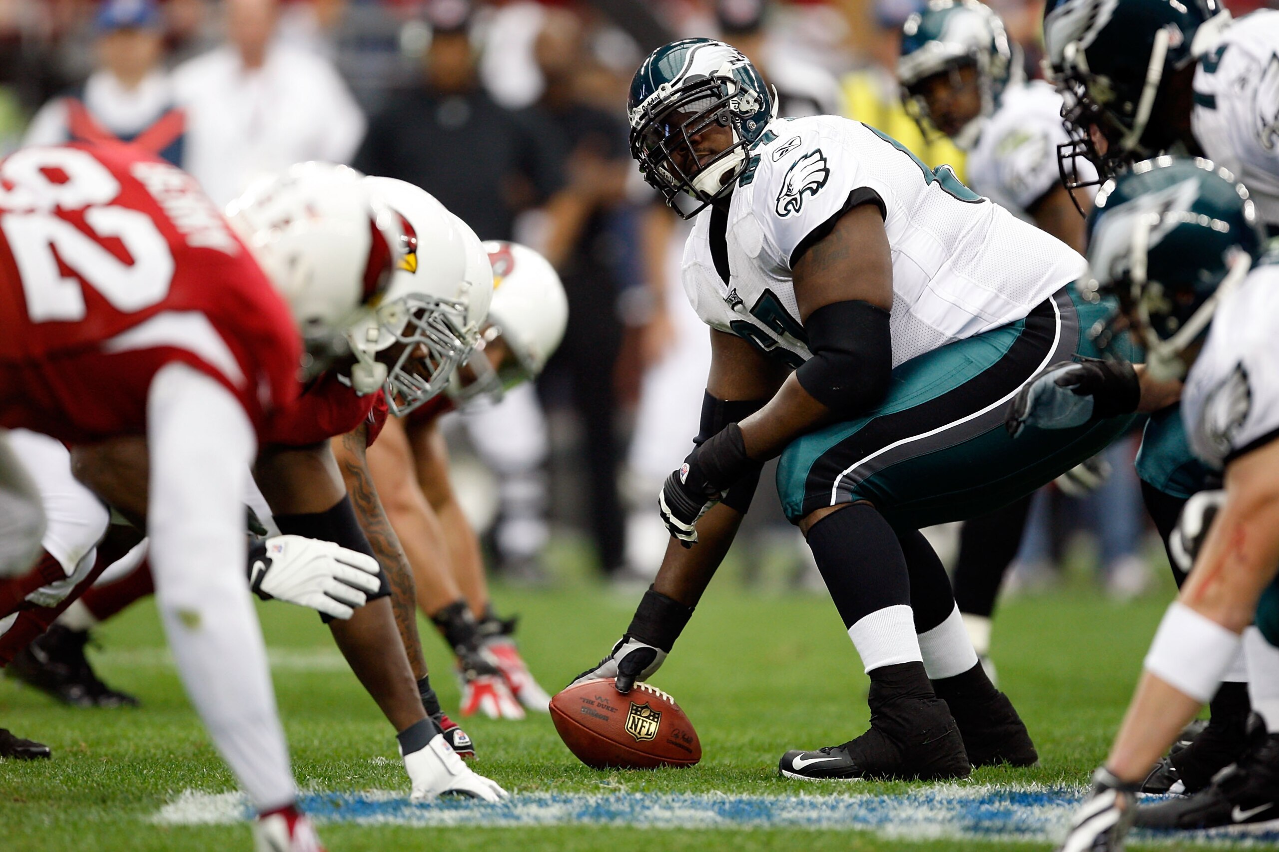 GLENDALE, AZ - JANUARY 18: Center Jamaal Jackson #67 of the Philadelphia Eagles looks over as he prepares to hike the ball during the NFC championship game against the Arizona Cardinals on January 18, 2009 at University of Phoenix Stadium in Glendale, Ar GLENDALE, AZ - JANUARY 18: Center Jamaal Jackson #67 of the Philadelphia Eagles looks over as he prepares to hike the ball during the NFC championship game against the Arizona Cardinals on January 18, 2009 at University of Phoenix Stadium in Glendale, Ar