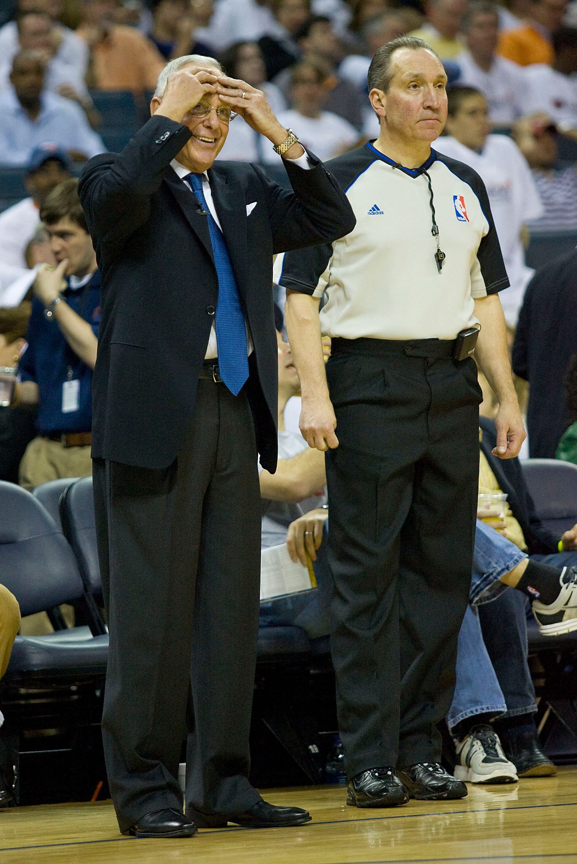 CHARLOTTE, NC - APRIL 26:  Charlotte Bobcats head coach Larry Brown reacts to a call as official Joe De Rosa looks on during second quarter action against the Orlando Magic in Game Four of the Eastern Conference Quarterfinals during the 2010 NBA Playoffs