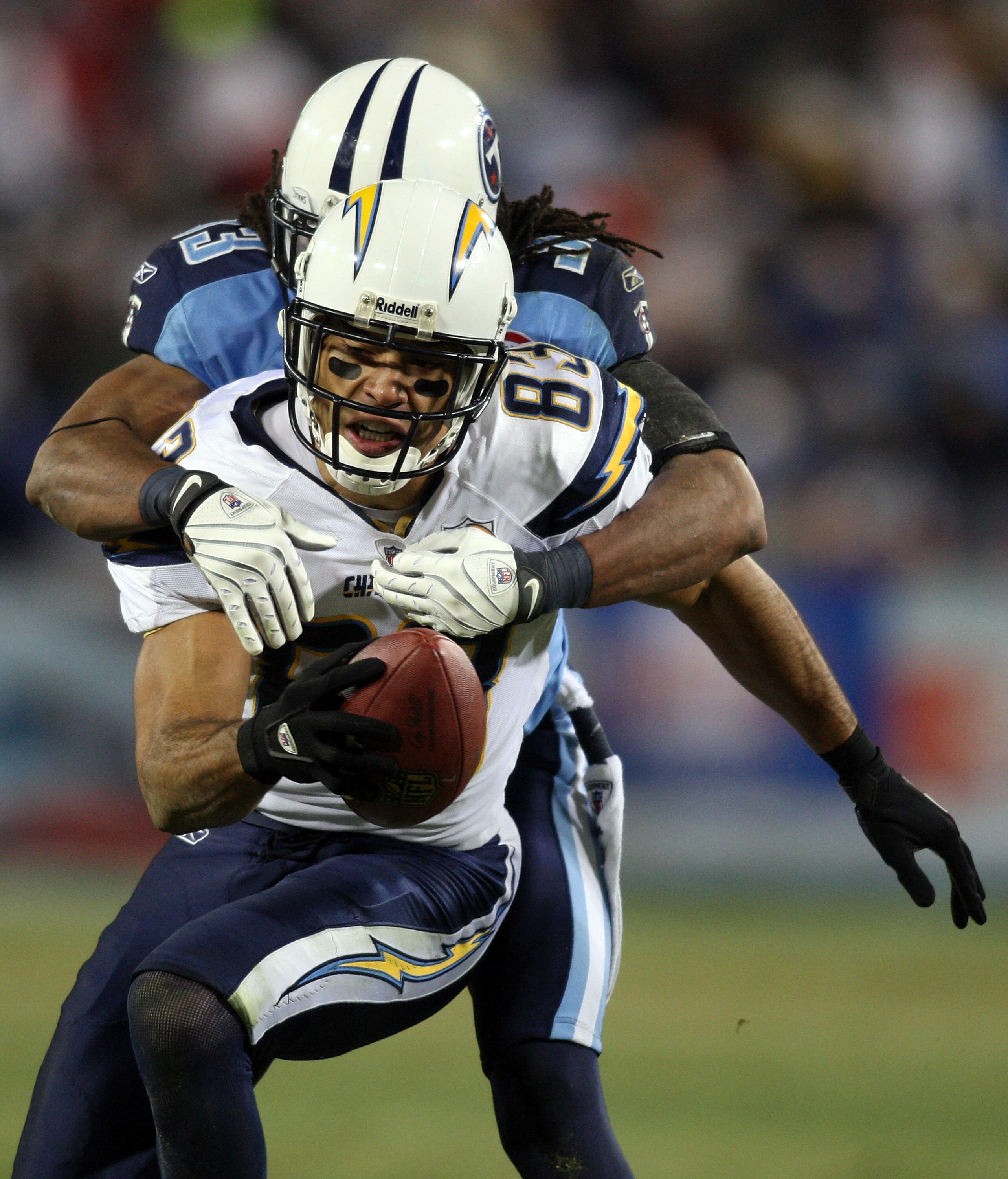 NASHVILLE, TN - DECEMBER 25: Michael Griffin #33 of the Tennessee Titans woks to bring down Vincent Jackson #83 of the San Diego Chargers on December 25, 2009 at LP Field in Nashville, Tennessee. (Photo by Rex Brown/Getty Images)