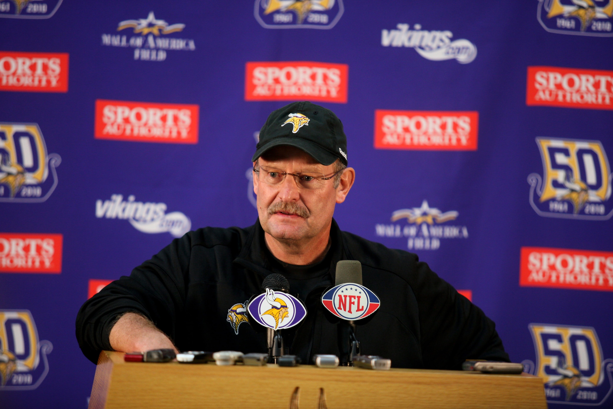 EDEN PRAIRIE, MN - OCTOBER 7:  Minnesota Vikings head coach Brad Childress answers questions from the media during a press conference at Winter Park on October 7, 2010 in Eden Prairie, Minnesota.  (Photo by Adam Bettcher/Getty Images)