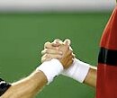 The End of Match Handshake: After wasting a lead, so and so lost to Roger Federer.