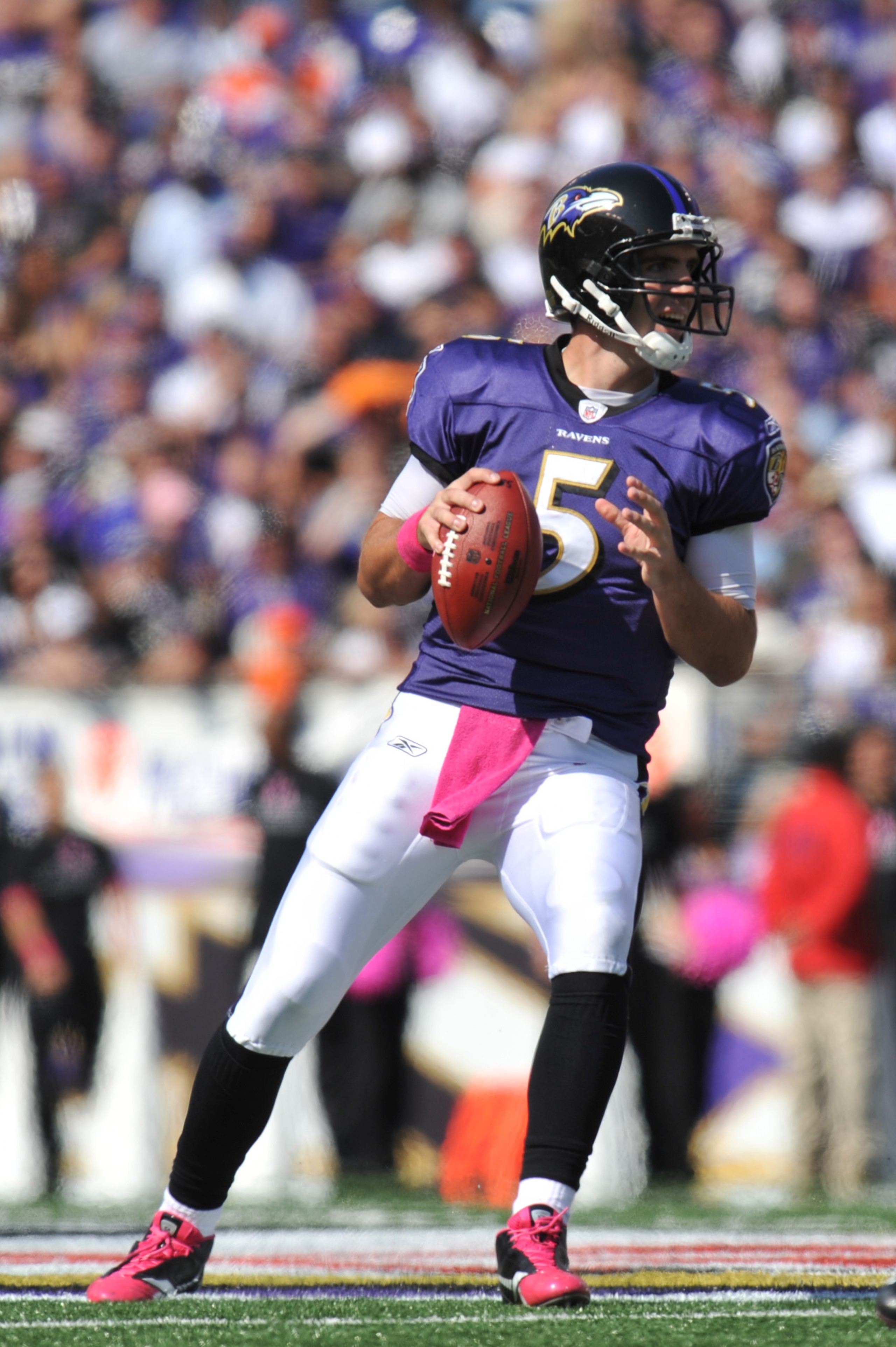 BALTIMORE, MD - OCTOBER 10: Joe Flacco #5 of the Baltimore Ravens passes during the game against the Denver Broncos at M&T Bank Stadium on October 10, 2010 in Baltimore, Maryland. Players wore pink in recognition of Breast Cancer Awareness Month. The Rave BALTIMORE, MD - OCTOBER 10: Joe Flacco #5 of the Baltimore Ravens passes during the game against the Denver Broncos at M&T Bank Stadium on October 10, 2010 in Baltimore, Maryland. Players wore pink in recognition of Breast Cancer Awareness Month. The Rave