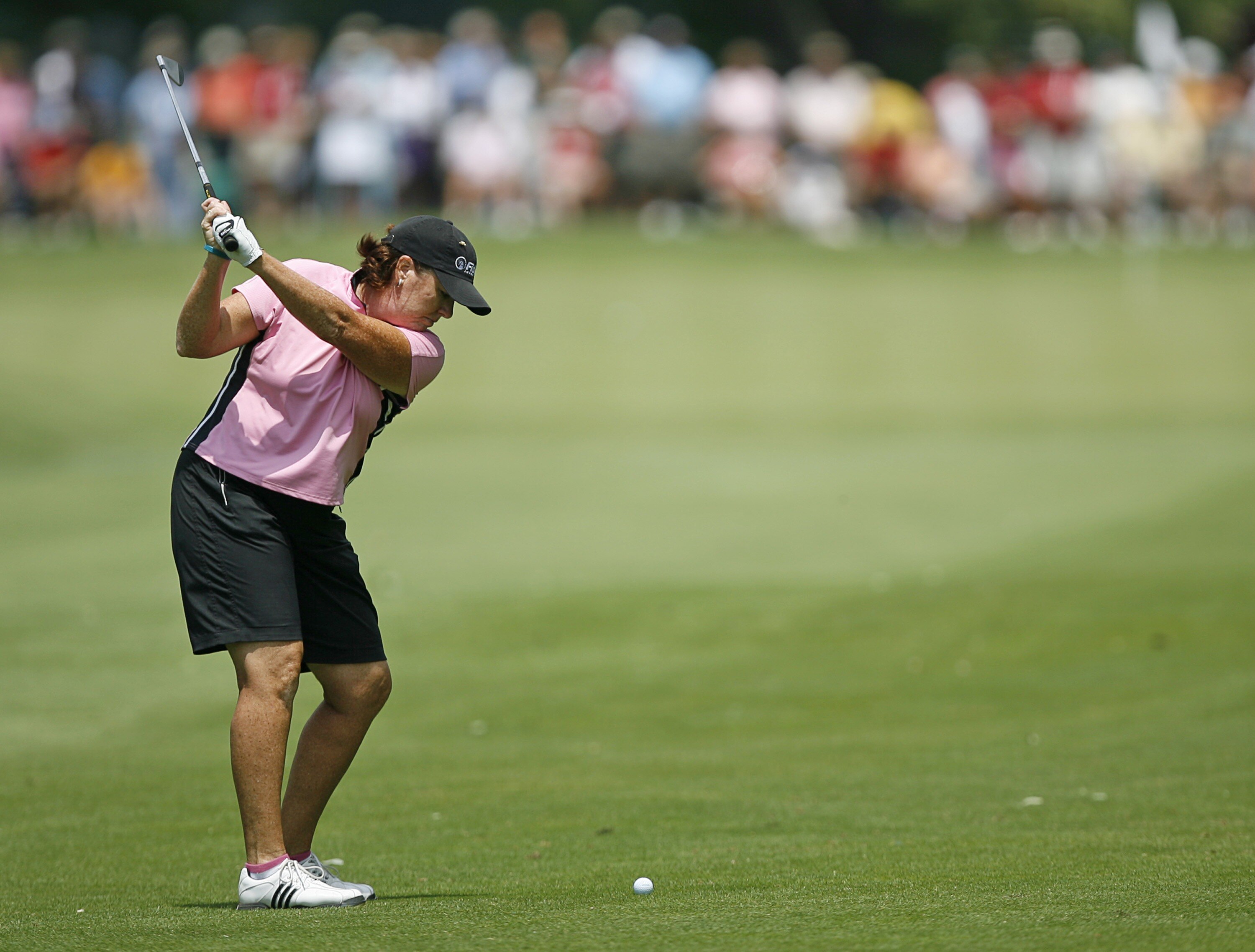SYLVANIA, OH - JULY 14: Meg Mallon hits her second shot on the 4th hole during the third round of the Jamie Farr Owens Corning Classic on July 14, 2007 in Sylvania, Ohio. (Photo by Hunter Martin/Getty Images)