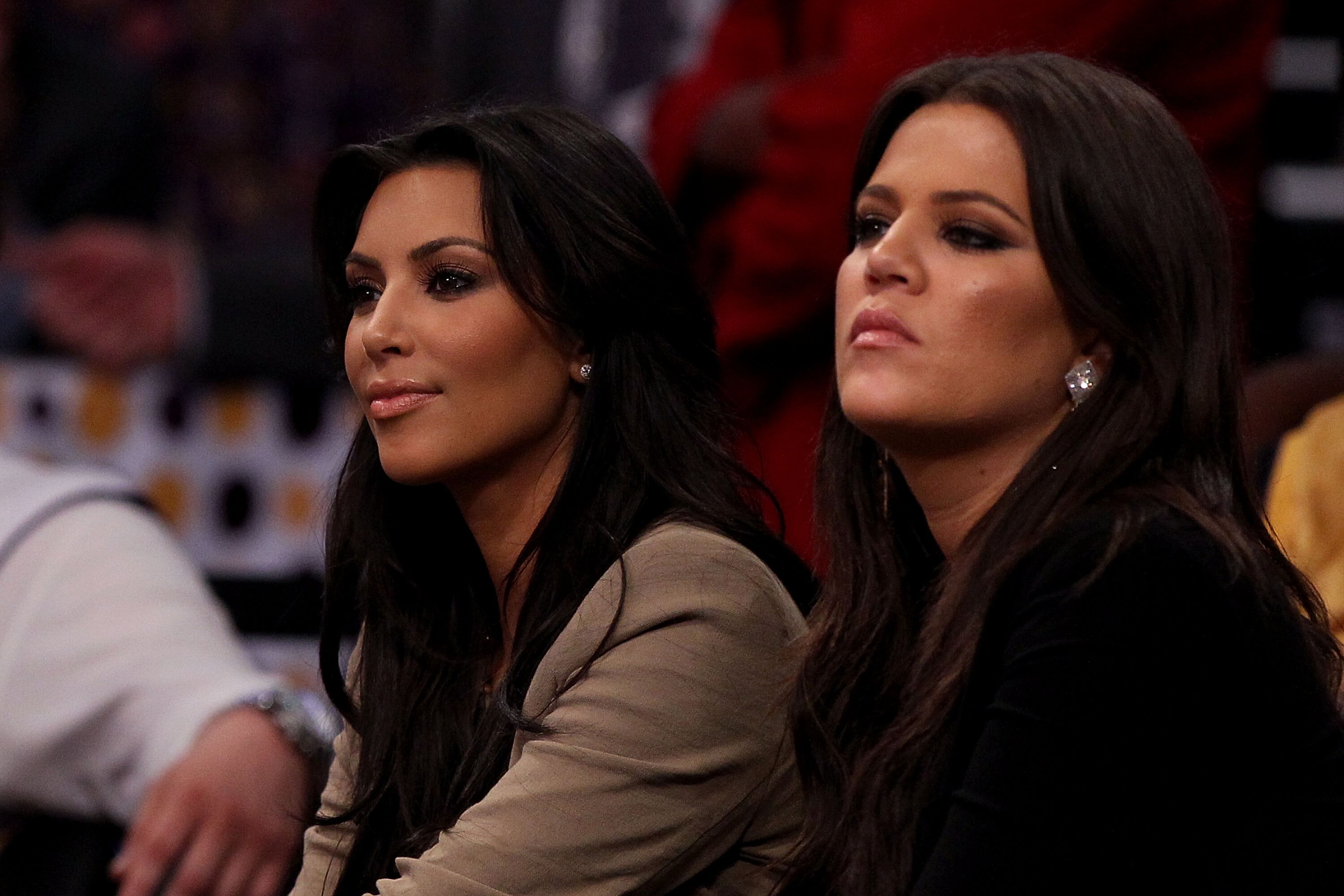 LOS ANGELES, CA - JUNE 17:  (L-R) Kim and Khloe Kardashian sit courtside at Game Seven of the 2010 NBA Finals at Staples Center between the Boston Celtics and the Los Angeles Lakers on June 17, 2010 in Los Angeles, California.  NOTE TO USER: User expressl