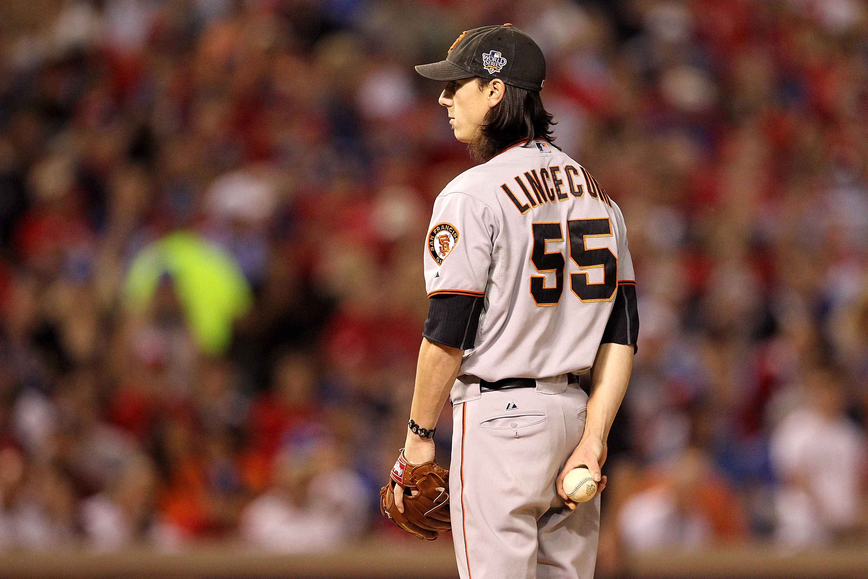 ARLINGTON, TX - NOVEMBER 01:  Tim Lincecum #55 of the San Francisco Giants gets set to throw a pitch against the Texas Rangers in Game Five of the 2010 MLB World Series at Rangers Ballpark in Arlington on November 1, 2010 in Arlington, Texas. The Giants w