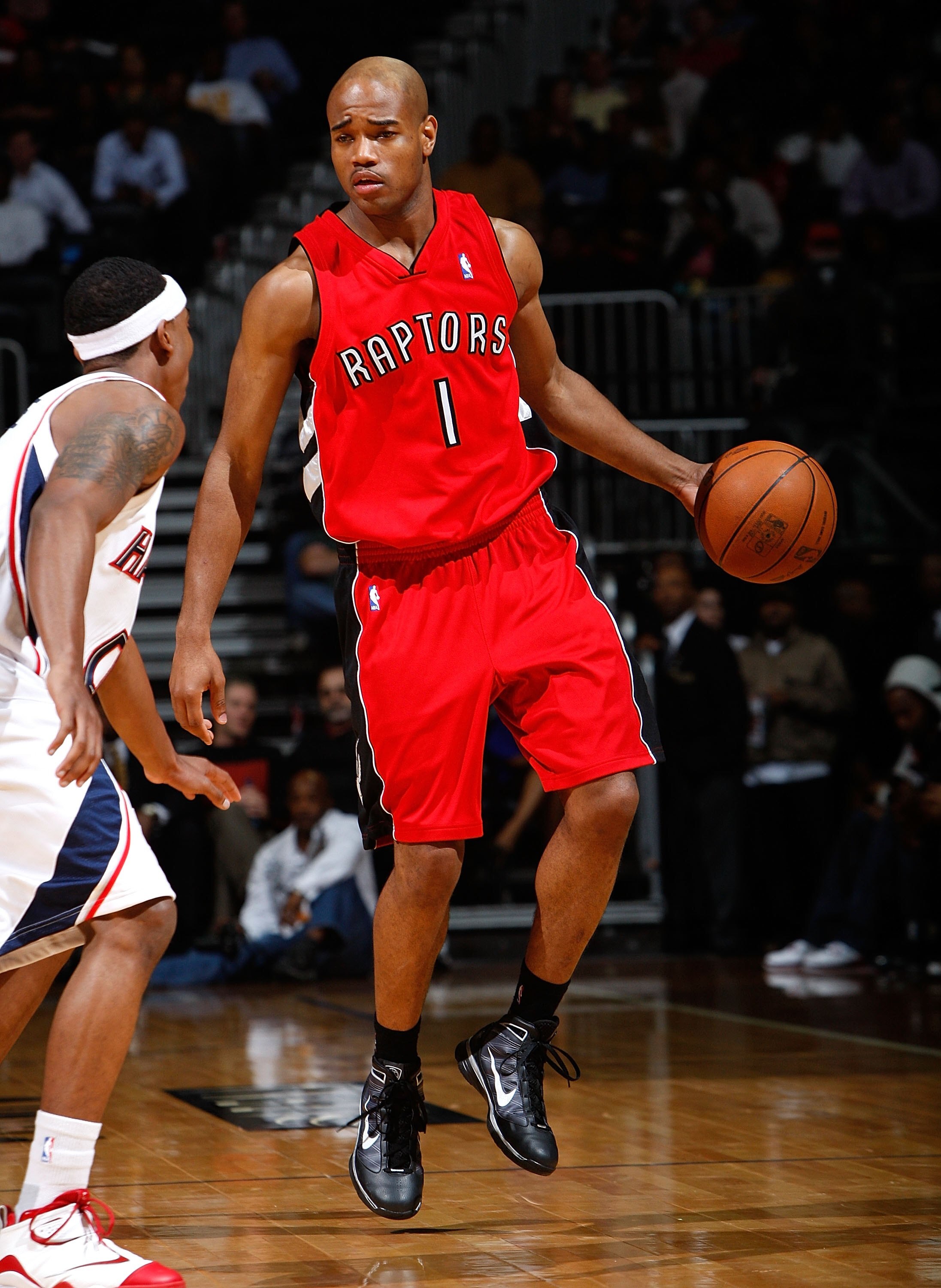 ATLANTA - DECEMBER 02:  Jarrett Jack #1 of the Toronto Raptors against the Atlanta Hawks at Philips Arena on December 2, 2009 in Atlanta, Georgia.  NOTE TO USER: User expressly acknowledges and agrees that, by downloading and/or using this Photograph, Use