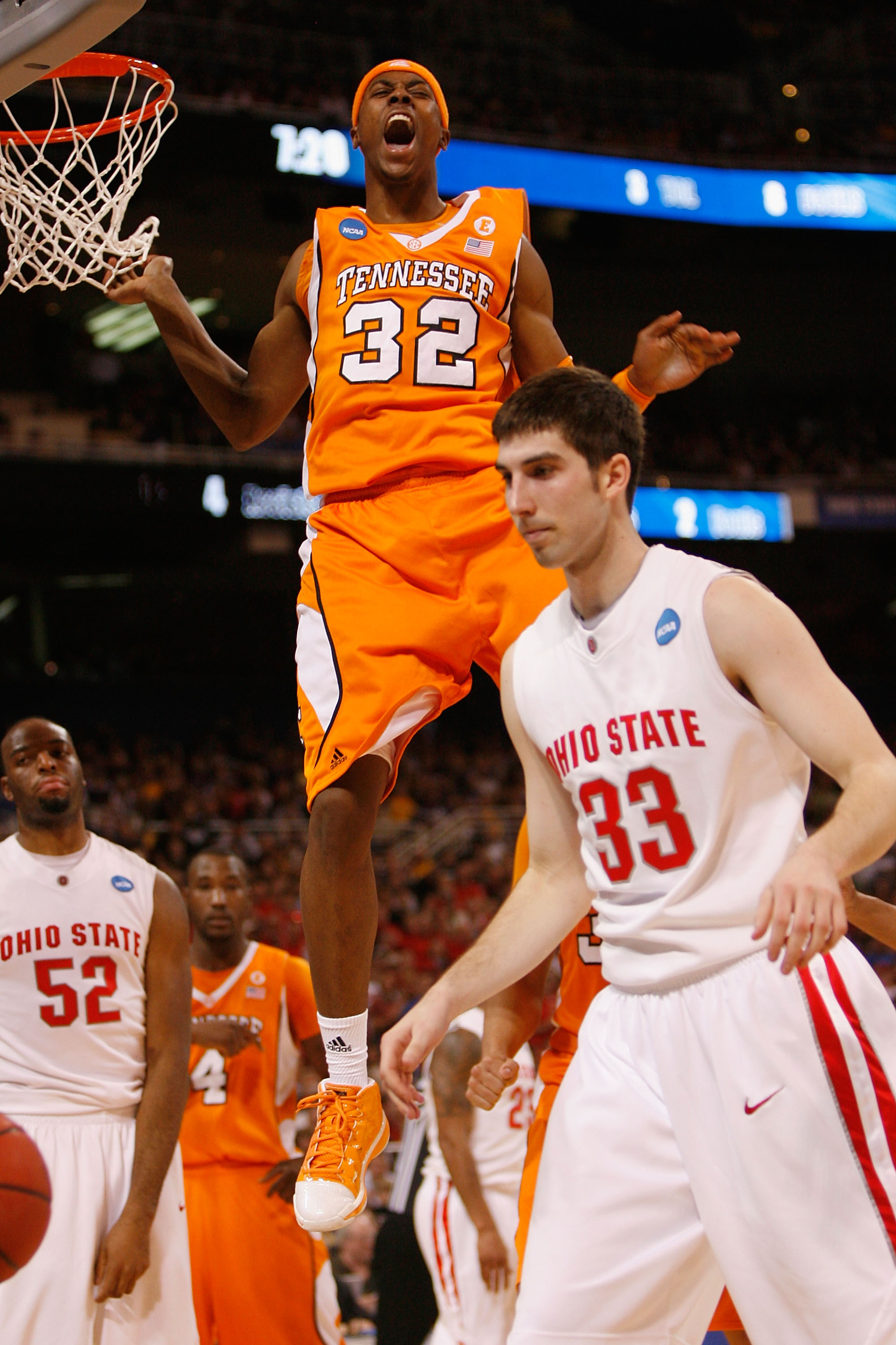 ST. LOUIS - MARCH 26: Scotty Hopson #32 of the Tennessee Volunteers celebrates a basket against the Ohio State Buckeyes during the midwest regional semifinal of the 2010 NCAA men's basketball tournament at the Edward Jones Dome on March 26, 2010 in St. Lo