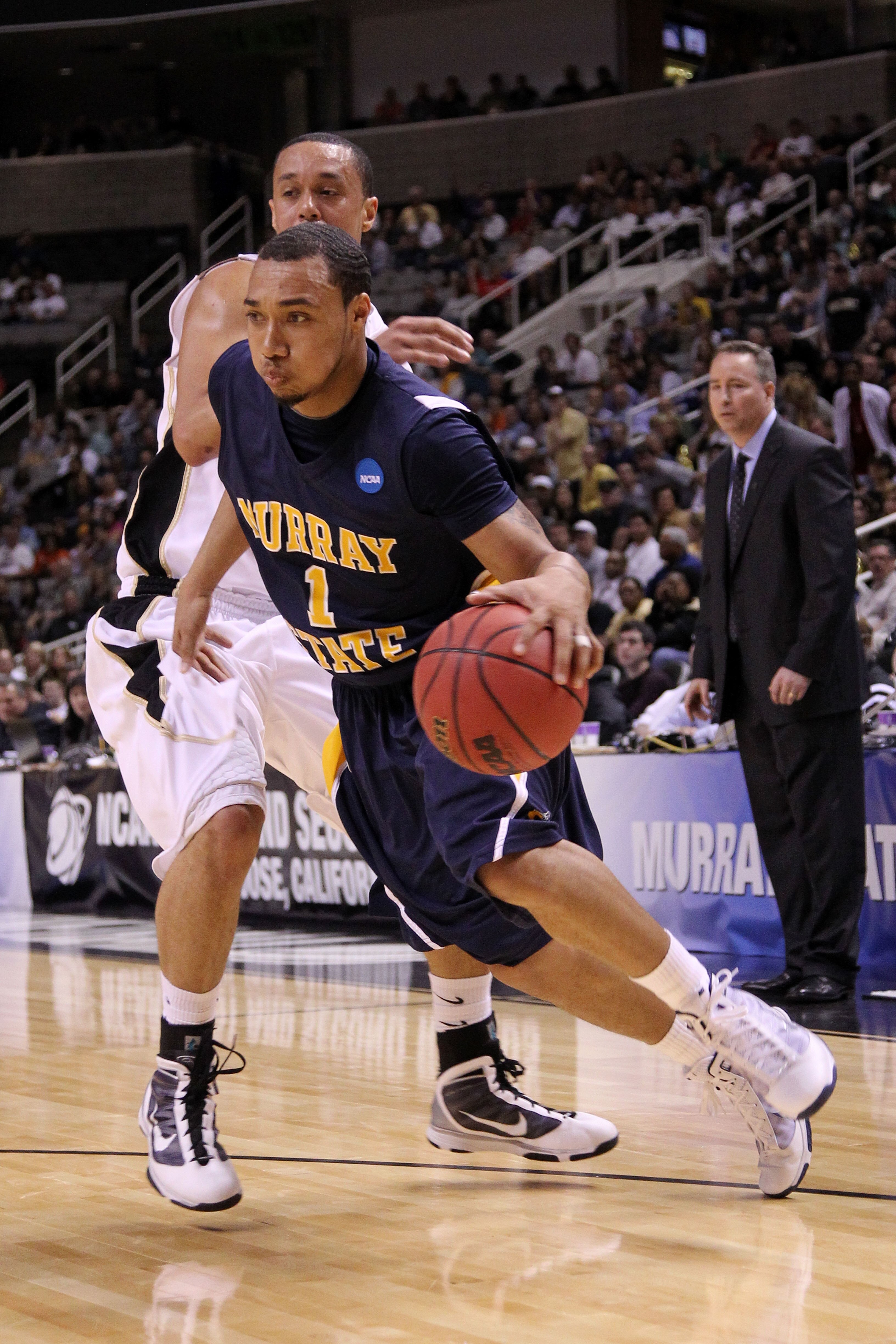 SAN JOSE, CA - MARCH 18:  Guard B.J. Jenkins #1 of the Murray State Racers drives with the ball against the Vanderbilt Commodores during the first round of the 2010 NCAA menï¿½s basketball tournament at HP Pavilion on March 18, 2010 in San Jose, California.