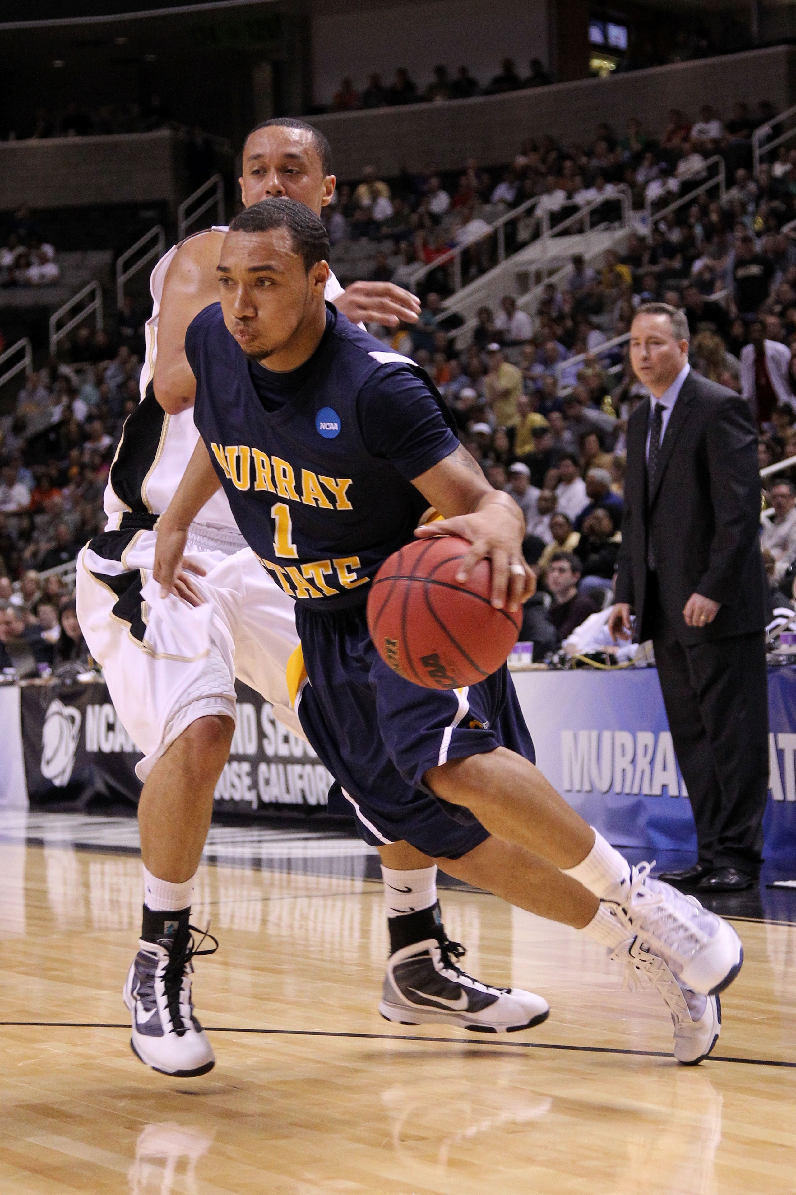 SAN JOSE, CA - MARCH 18:  Guard B.J. Jenkins #1 of the Murray State Racers drives with the ball against the Vanderbilt Commodores during the first round of the 2010 NCAA menï¿½s basketball tournament at HP Pavilion on March 18, 2010 in San Jose, California.